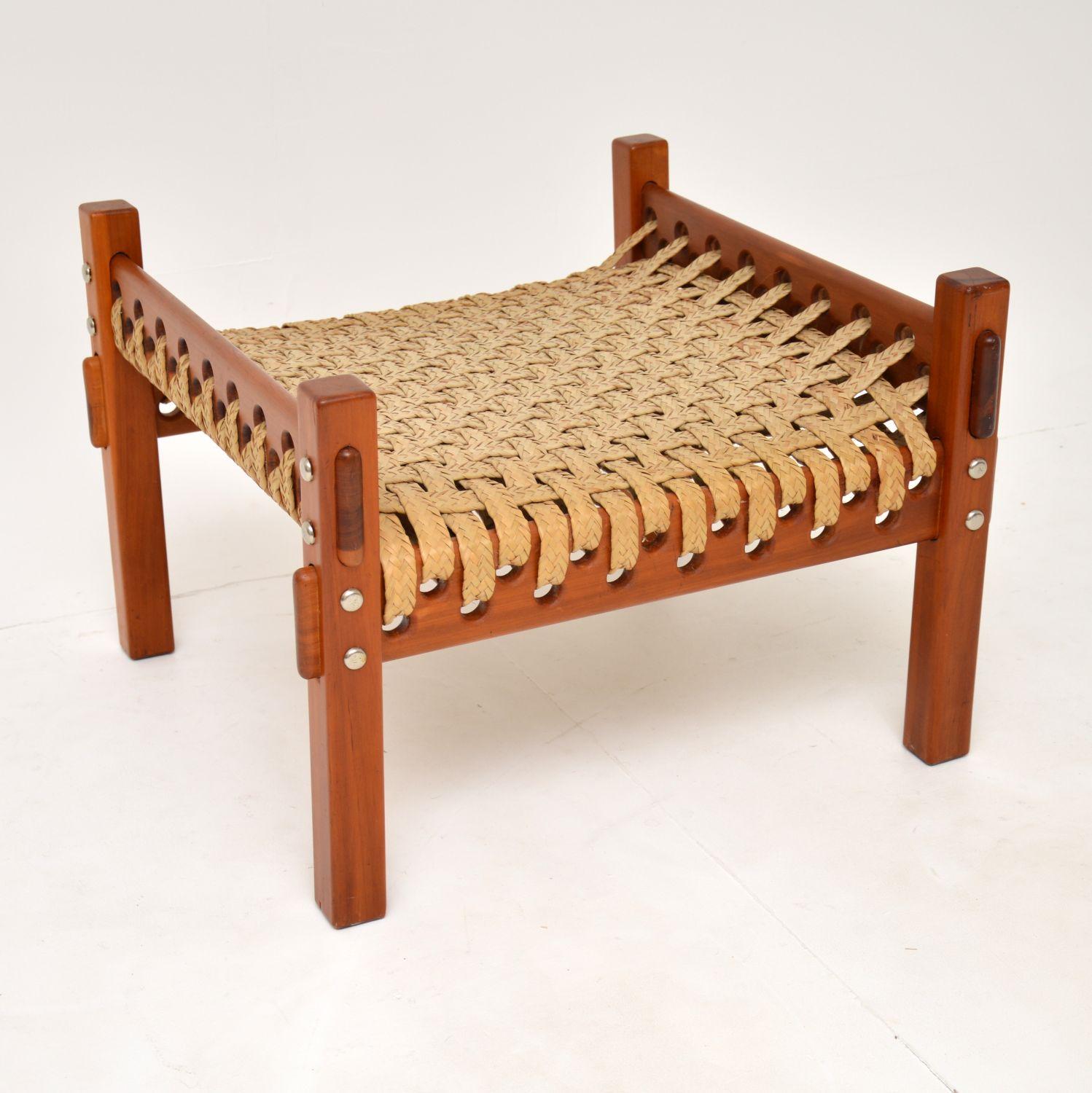 A beautiful and unusual vintage stool, most likely made in Brazil and dating from the 1960-1970’s.

This has a fantastic design,it is a very quirky and striking item. The seat is beautifully woven with broad flat cord, and the frame is well made