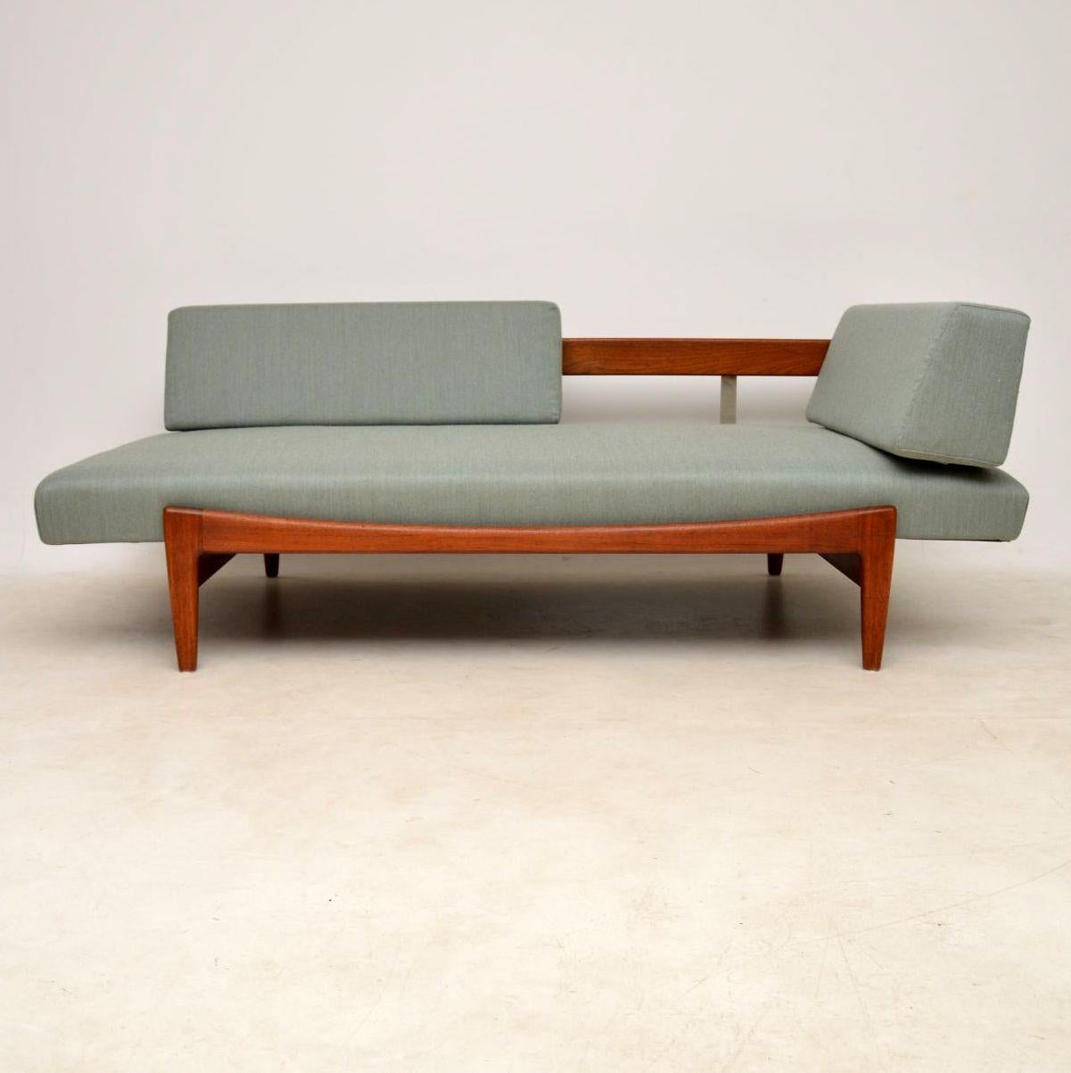 A magnificent vintage sofa/daybed in solid teak, this was designed by the famous Danish designer IB Kofod Larsen, it was made in Sweden by Seffle Mobelfabrik in the 1960s. You can see how beautiful this is from the photos, but they still don’t fully