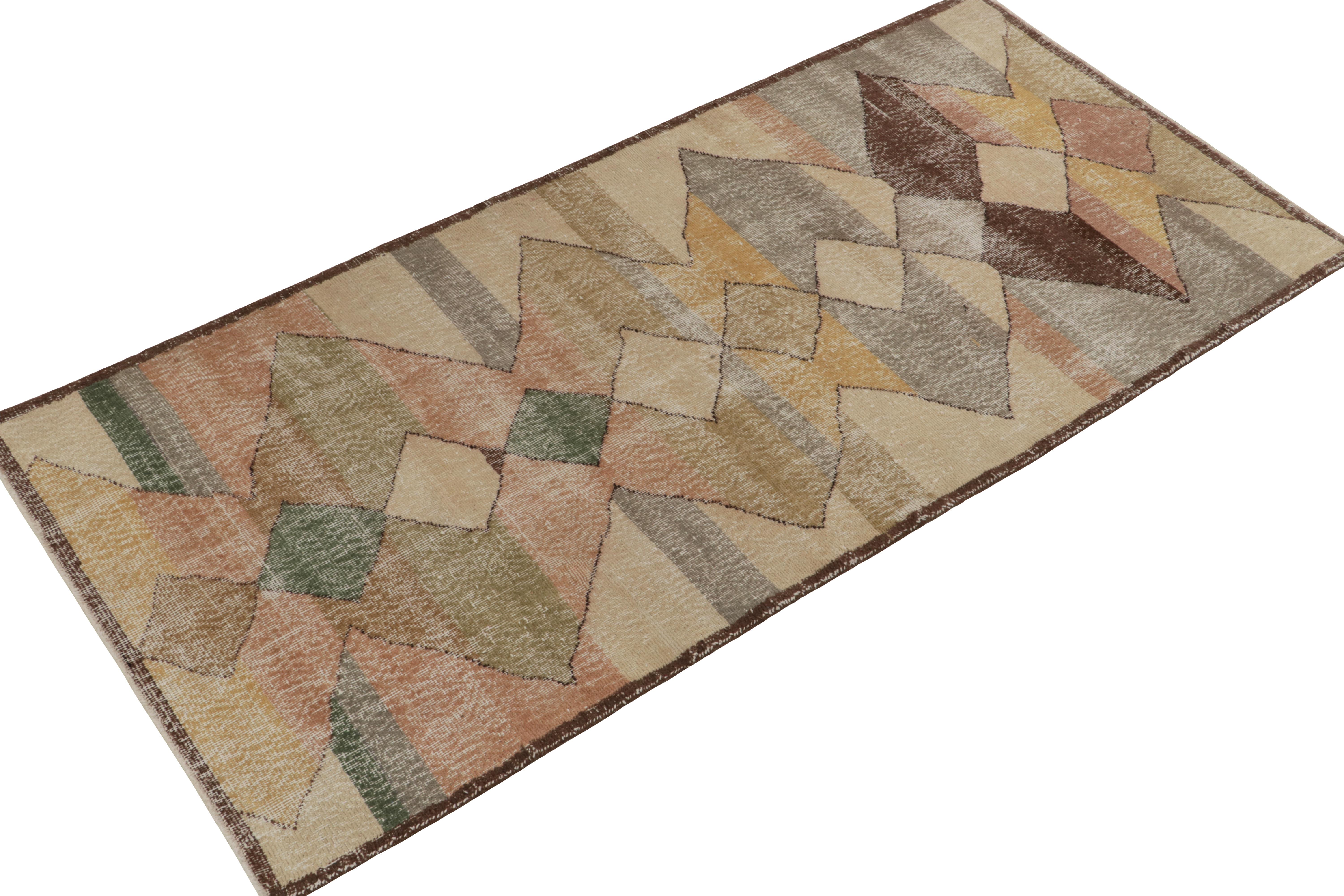 Hand-knotted in wool, a 4x8 vintage rug from a bold Turkish designer, entering Rug & Kilim’s commemorative Mid-Century Pasha Collection. 

The 1960s take on Art Deco style relishes a geometric pattern in subtle beige-brown with vibrant pink, green