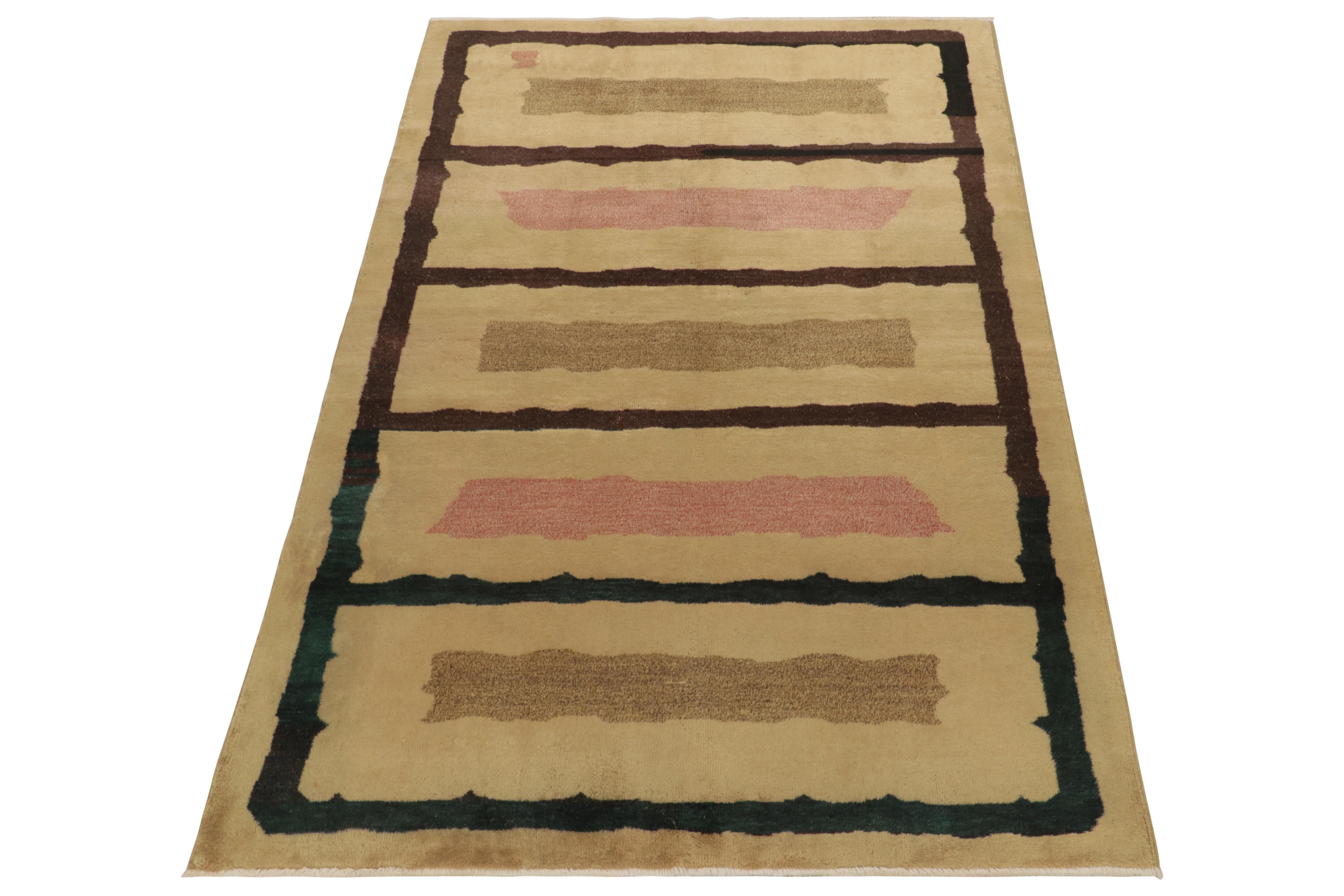 Originating from Turkey circa 1960-1970, a 5x9 vintage mid-century rug featuring a neat geometric pattern in variegated tones of pink and beige-brown. From Rug & Kilim’s Mid-Century Pasha Collection, commemorating the works of bold multidisciplinary