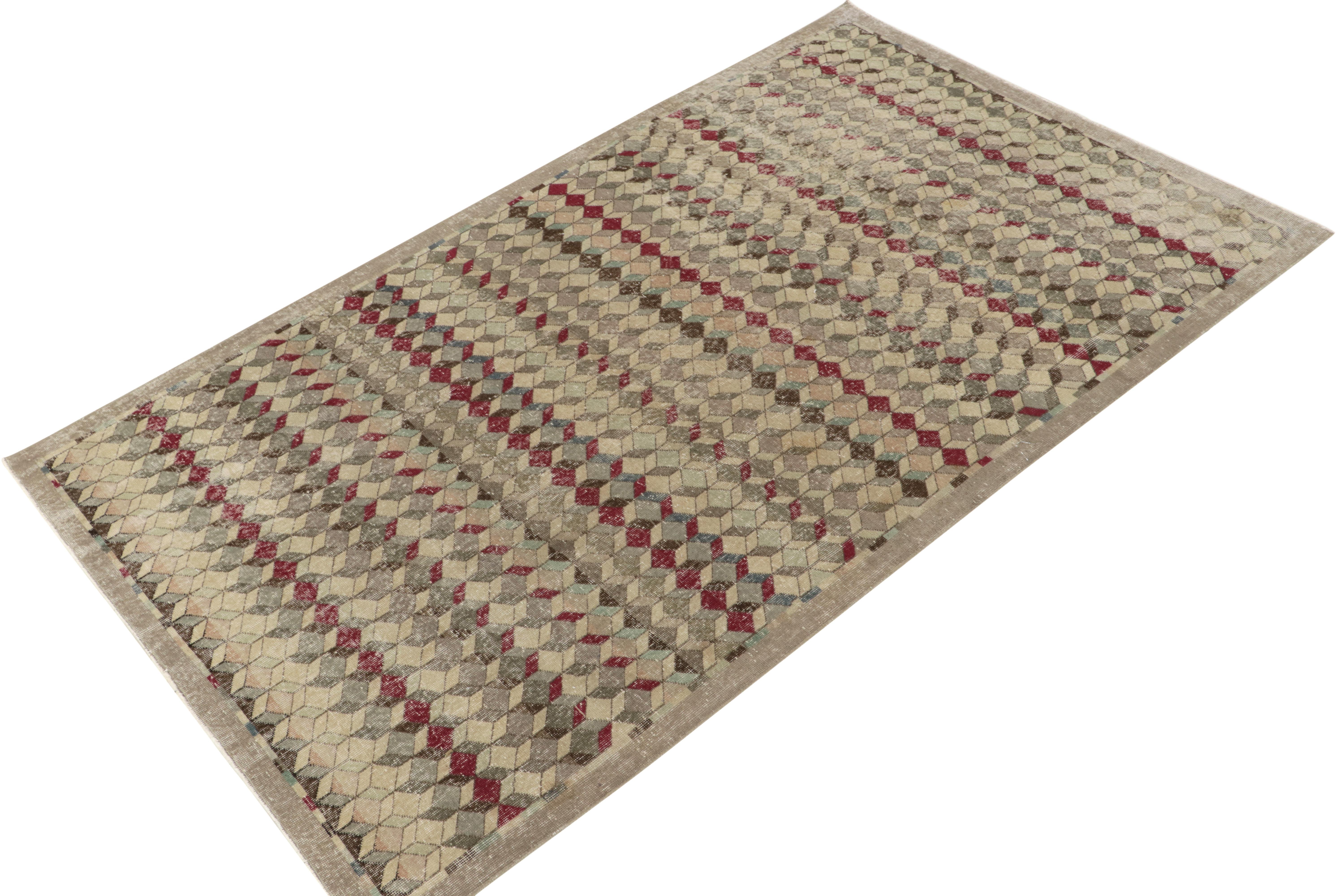A 6x10 vintage rug exemplifying bold Turkish art deco sensibilities, among the latest to join our Mid Century Pasha Collection. 

Coming from an innovative Turkish designer, this 1960s piece features movement with a depthful geometric pattern in