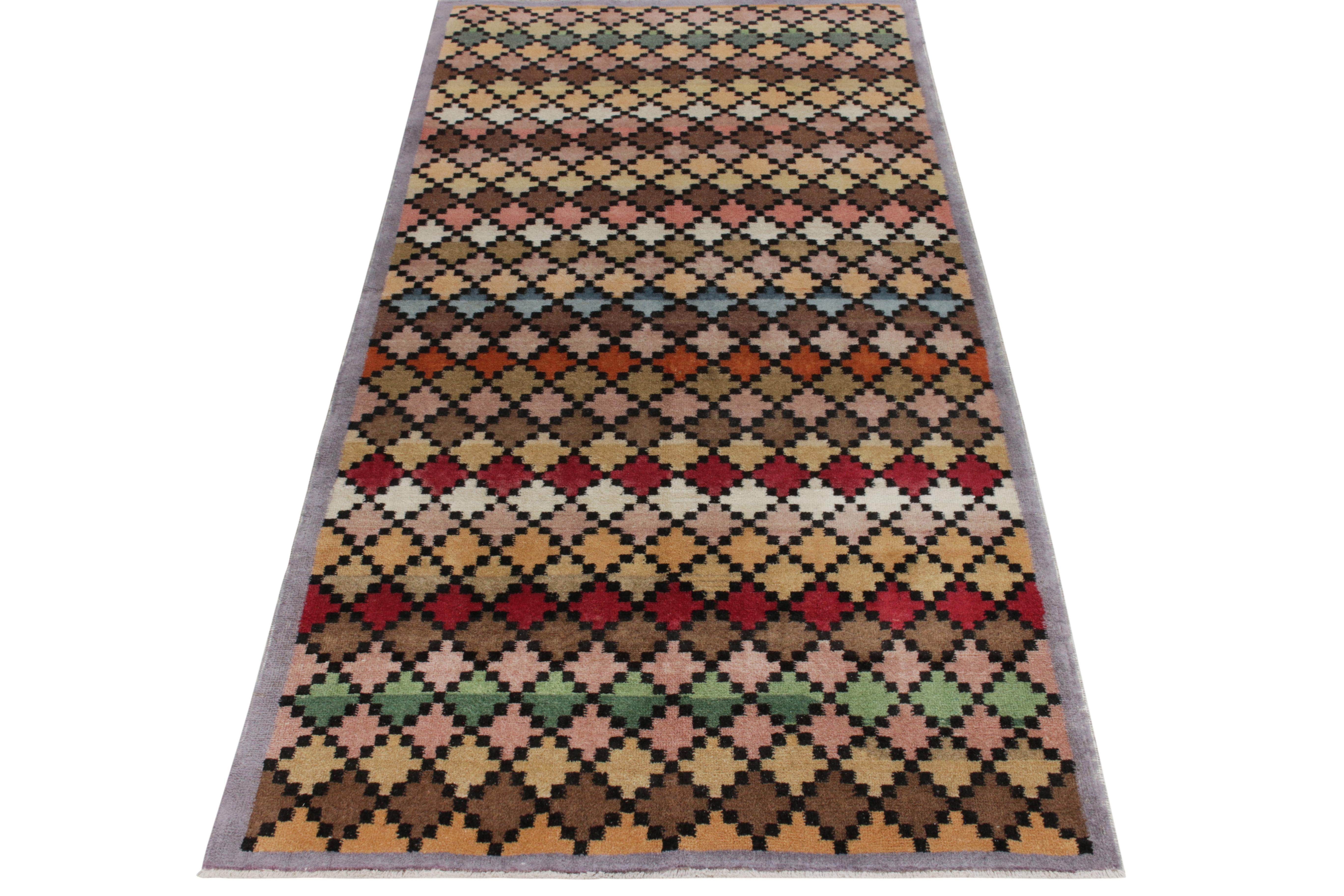Hand-knotted in wool circa 1960-1970, a 4X8 vintage rug from an Bold Turkish designer commemorated in Rug & Kilim’s Mid-Century Pasha Collection, featuring a series of geometric patterns in neat repetition for exceptional pagination on scale.