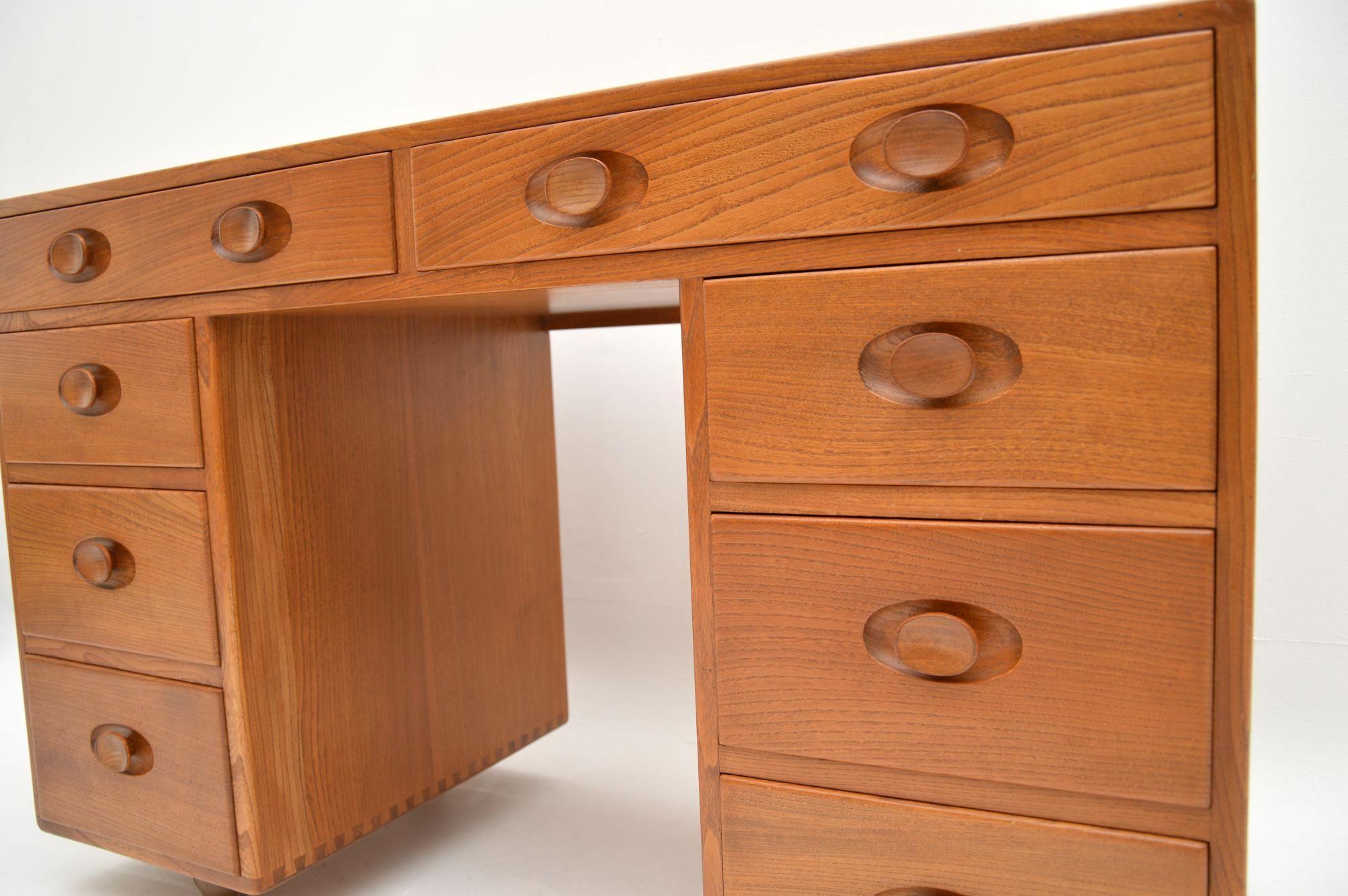 Mid-Century Modern 1960s Vintage Desk by Ercol in Solid Elm