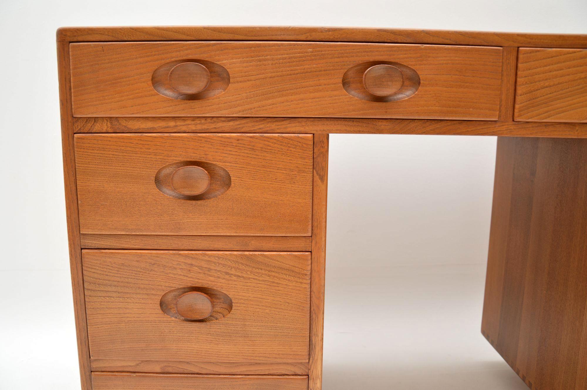 English 1960s Vintage Desk by Ercol in Solid Elm
