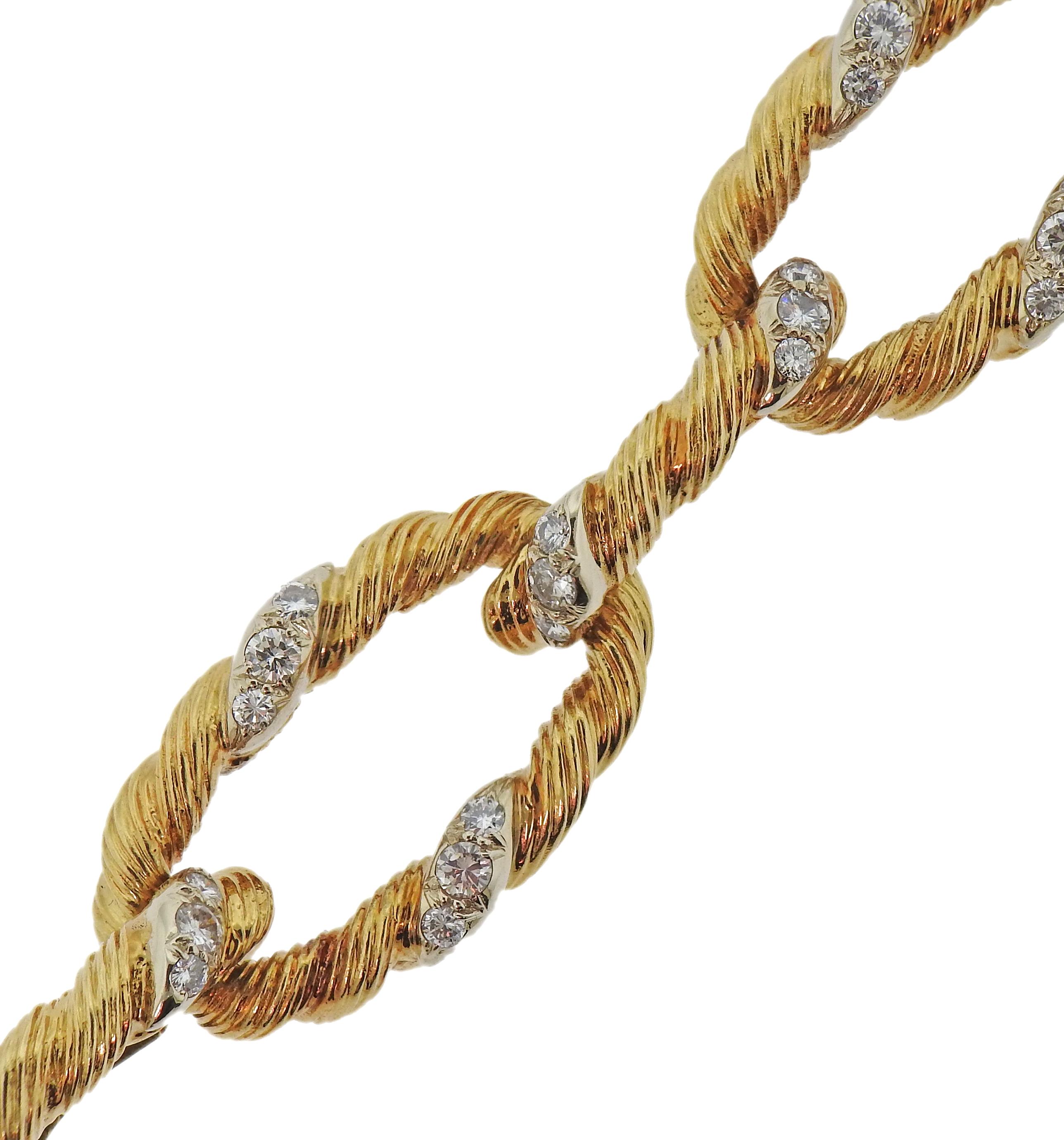 Vintage, circa 1960s 18k gold oval link bracelet, set with approx. 1.60ctw in diamonds. Bracelet is 7