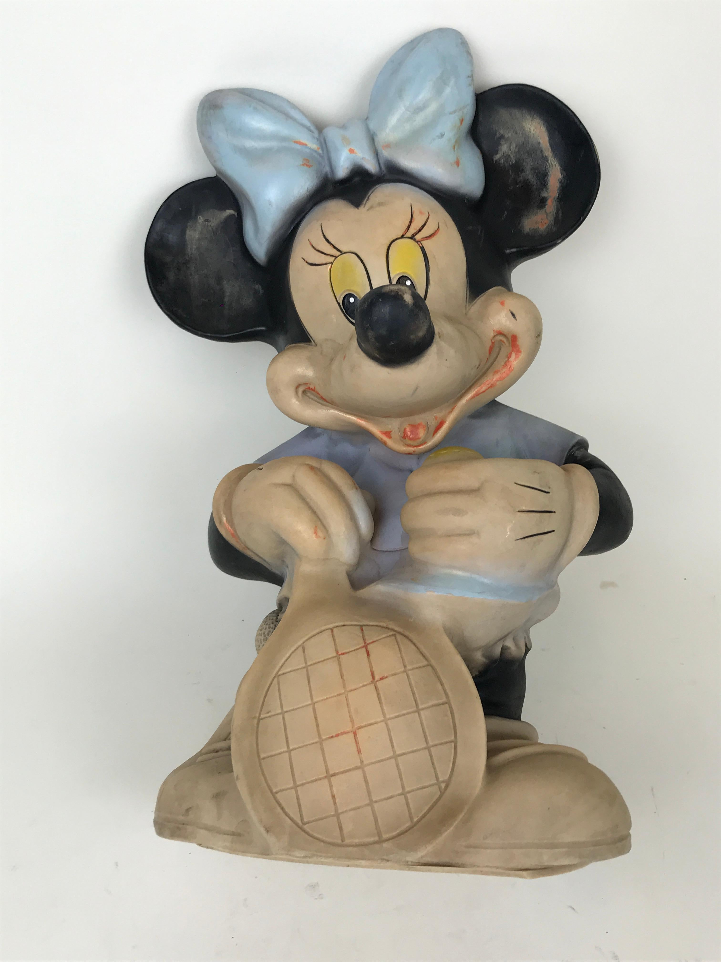 Very rare vintage Diseny Minnie Mouse with tennis racquet squeak rubber toy made by Biserka in ex Yugoslavia now Croatia in the 1960s.

Marked 