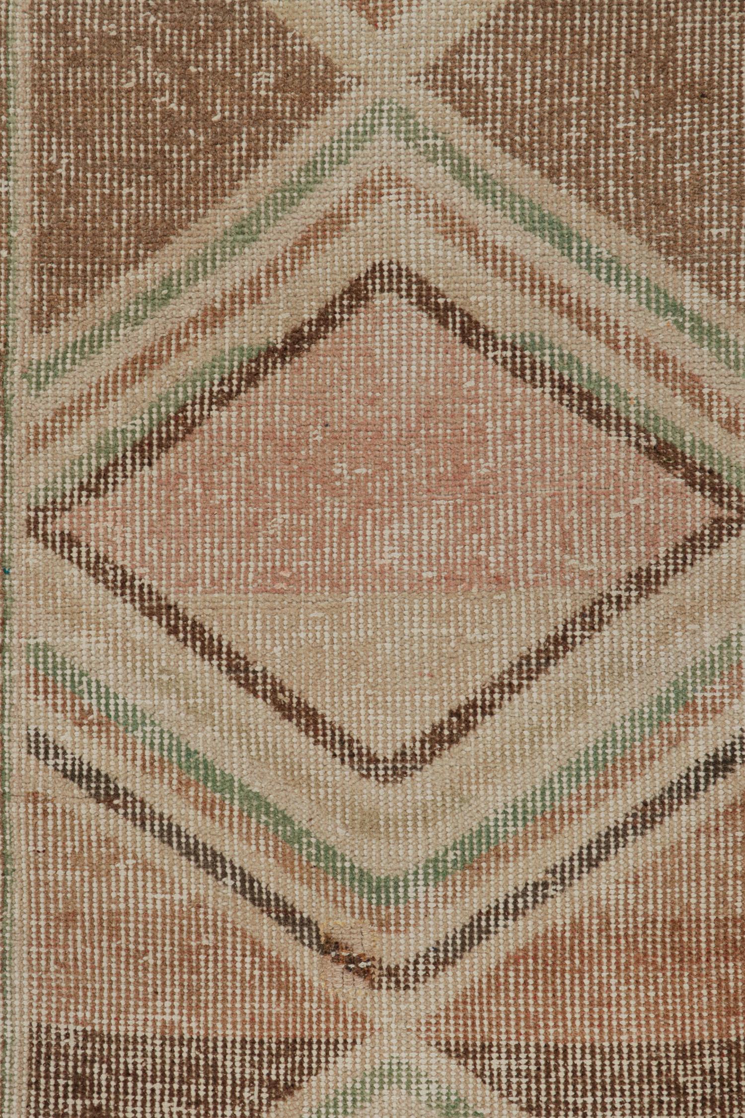 1960s Vintage Distressed Deco Rug in Beige-Brown, Pink and Green by Rug & Kilim In Good Condition For Sale In Long Island City, NY