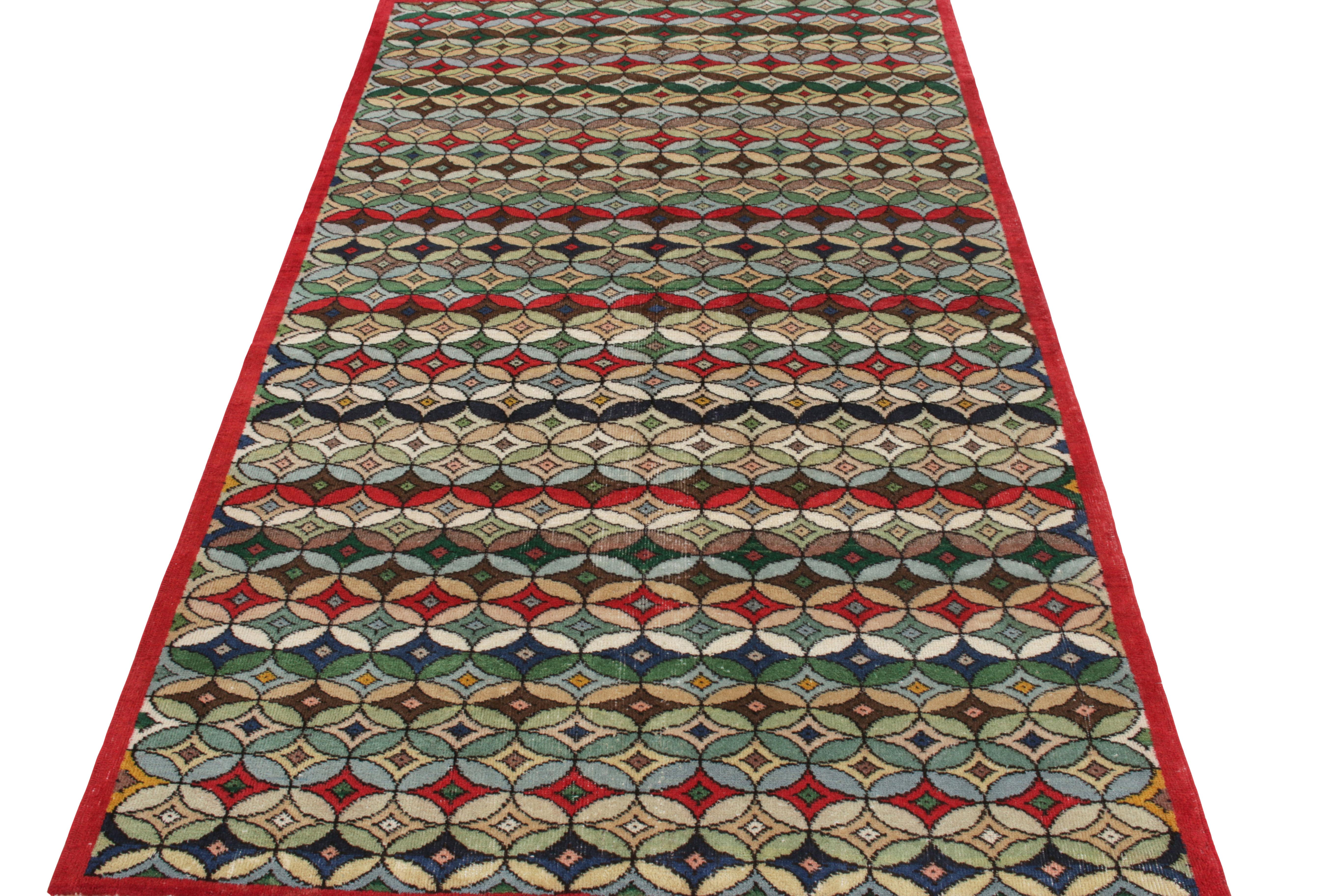 Hand-knotted in wool, a 5c9 vintage rug from a venerated multidisciplinary Turkish designer entering Rug & Kilim’s commemorative Mid-Century Pasha Collection. The iconic artist puts forward the best of his craft in a dextrous geometric pattern