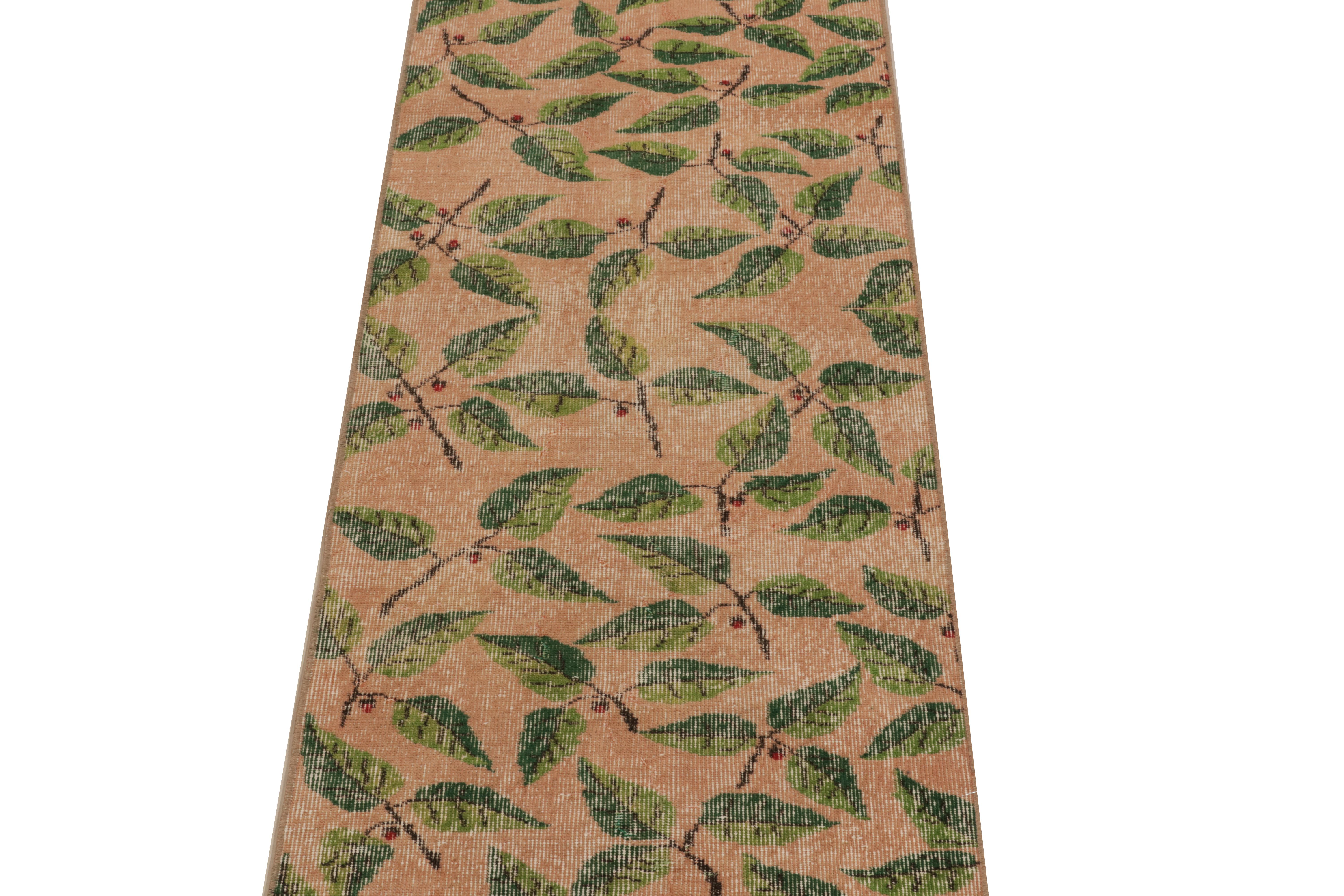 Indian 1960s Vintage Distressed Deco Runner in Pink Green Floral Pattern by Rug & Kilim For Sale