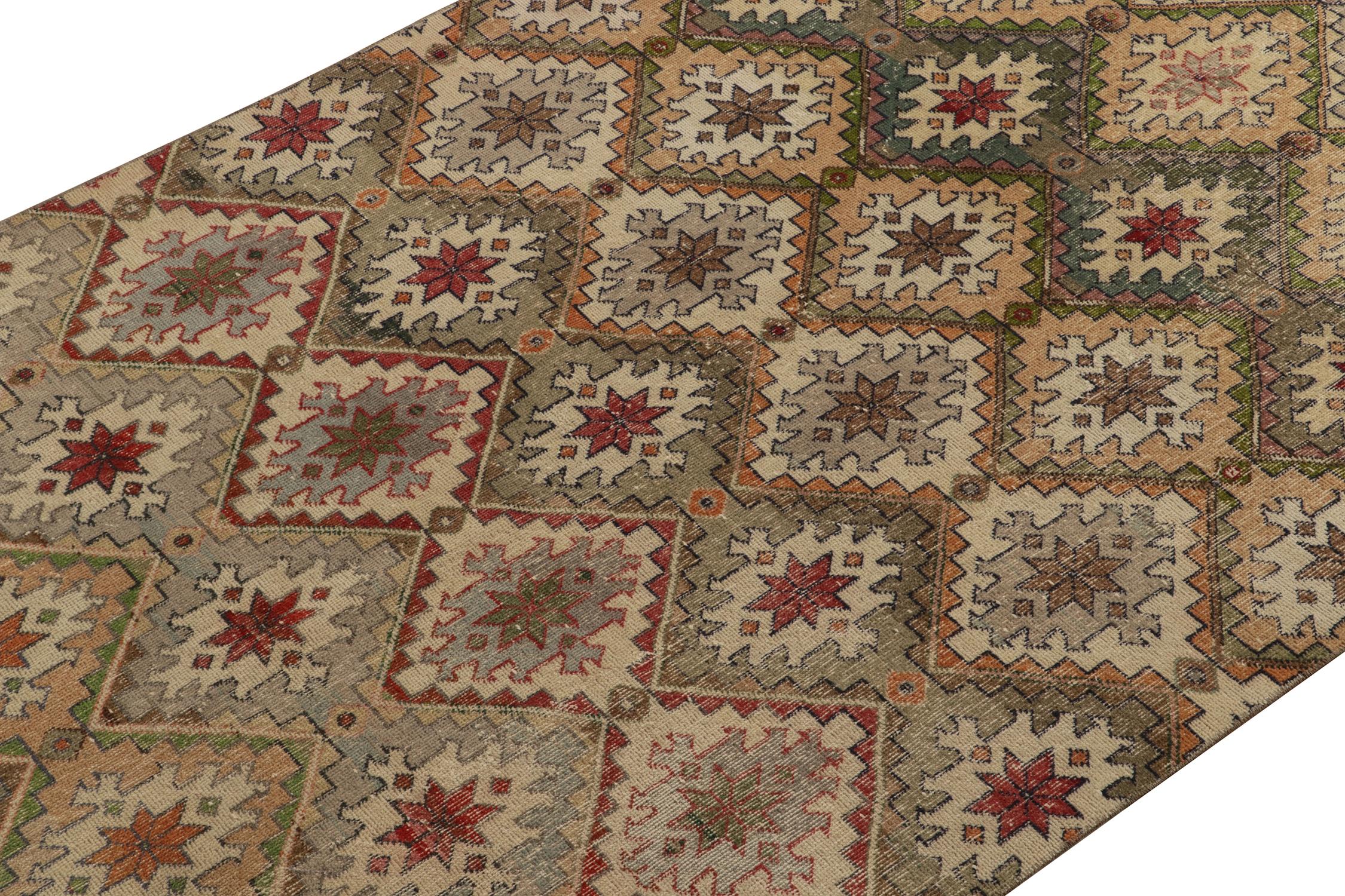 Turkish 1960s Vintage Distressed Rug in Beige-Brown with Colorful Pattern by Rug & Kilim For Sale