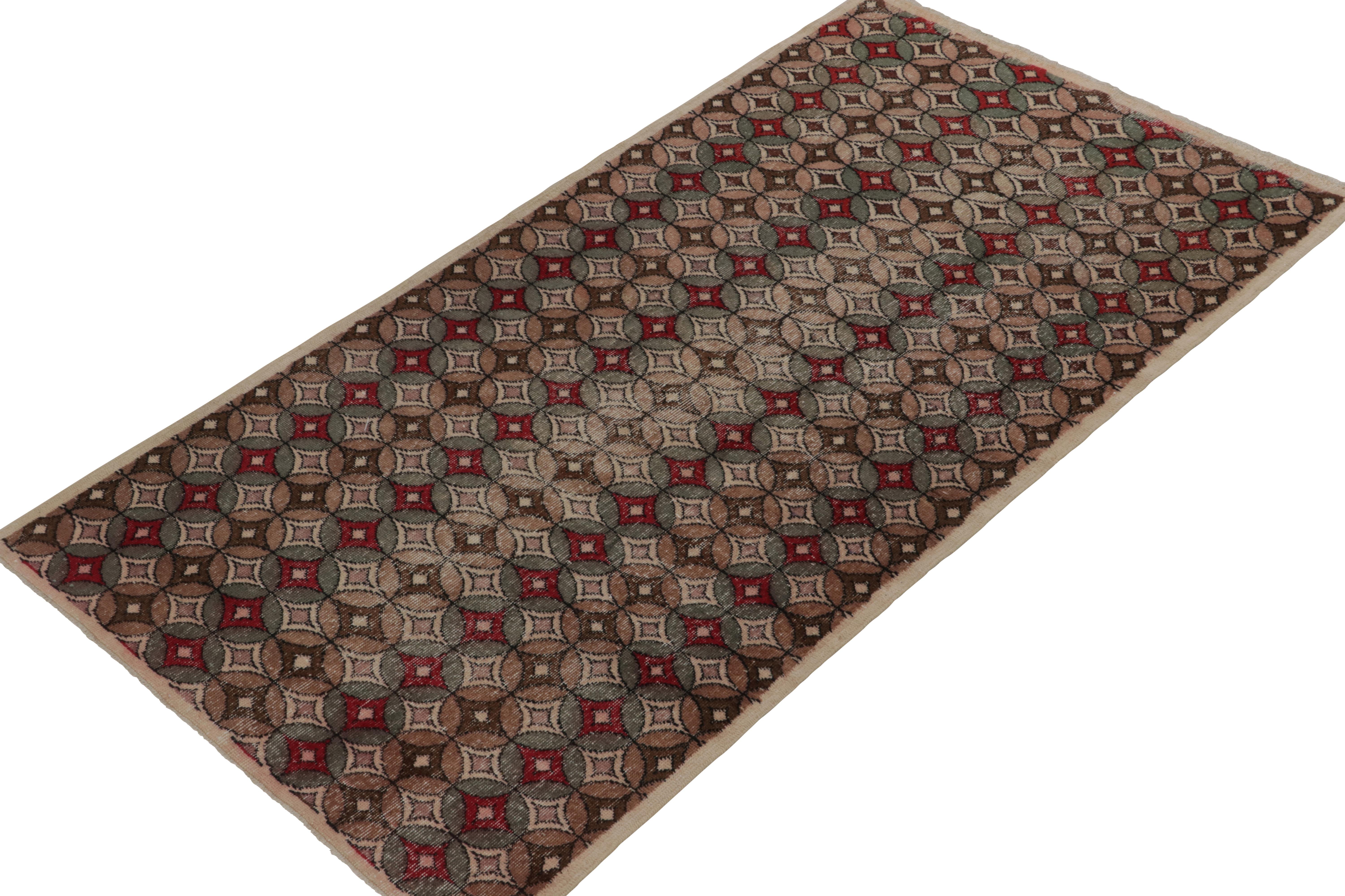 A vintage 4x8 mid-century rug from the Mid-Century Pasha Collection by Rug & Kilim, hand-knotted in wool circa 1960-1960. Joining a curation elebrating the rare styles of multi-disciplinary Turkish icon, Zeki Müren. 

On the Design: This piece is