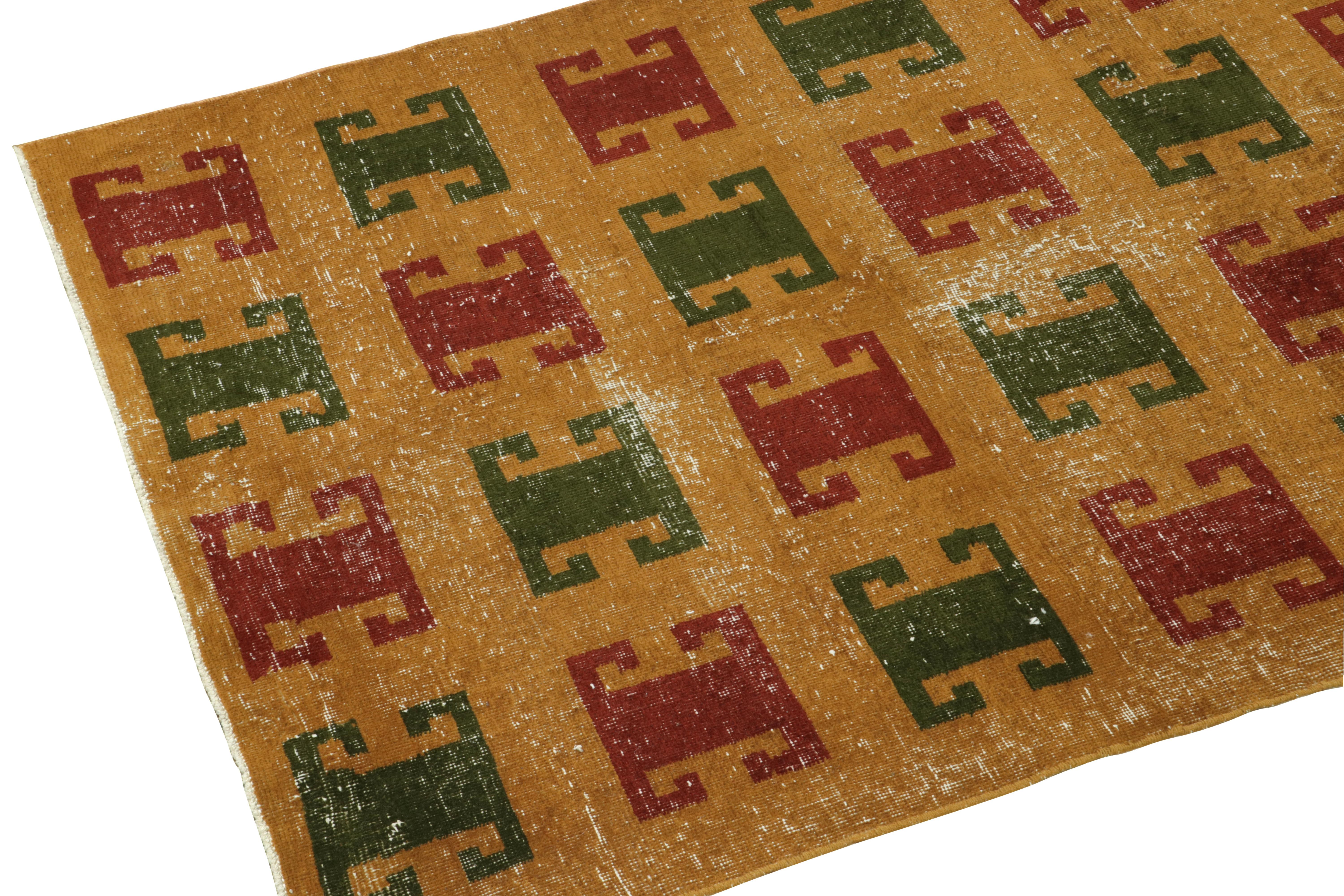 Turkish 1960s Vintage Distressed Rug in Gold, Red Green Geometric Pattern by Rug & Kilim For Sale
