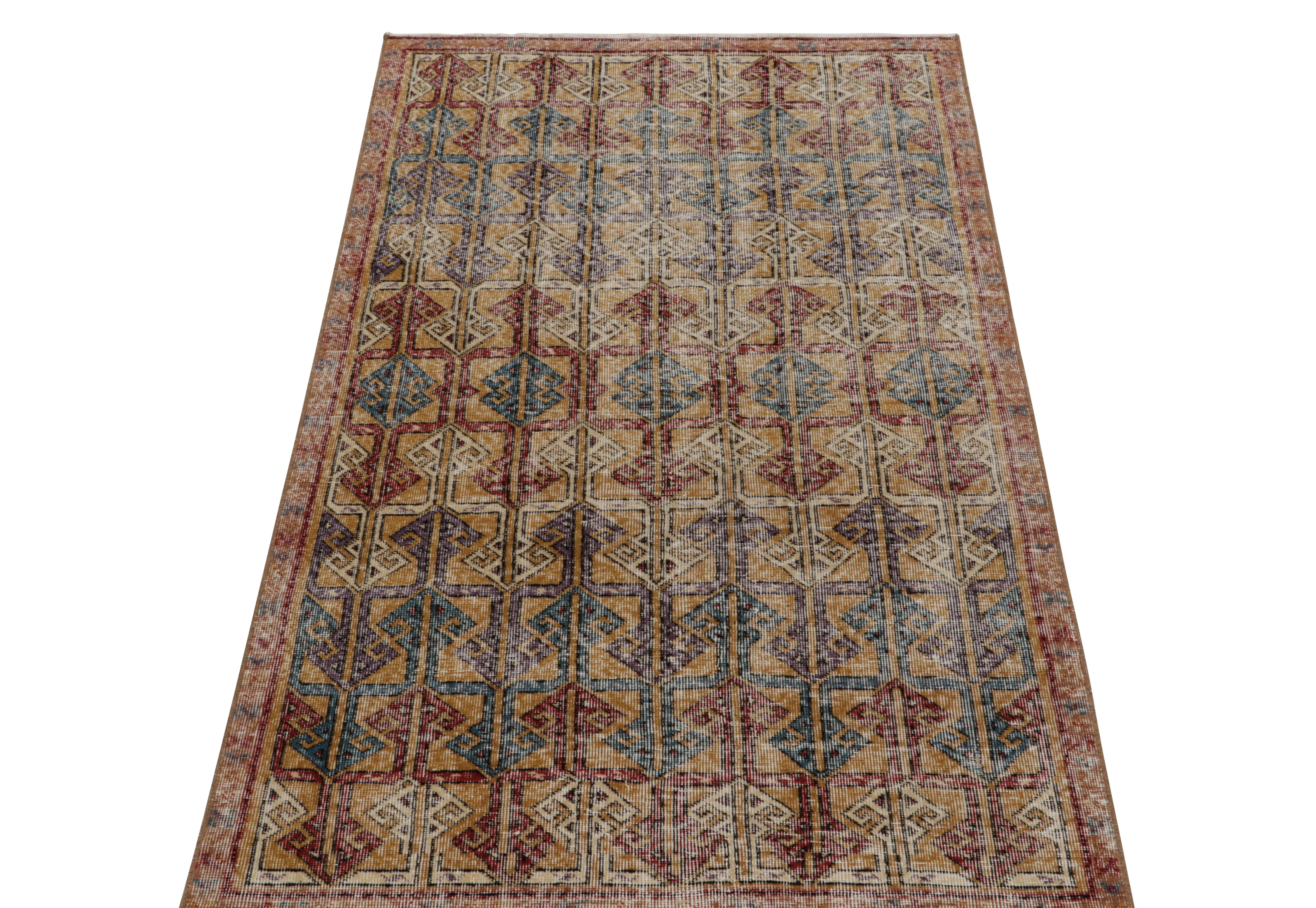 Turkish 1960s Vintage Distressed Rug in Golden-Brown Geometric Patterns by Rug & Kilim For Sale