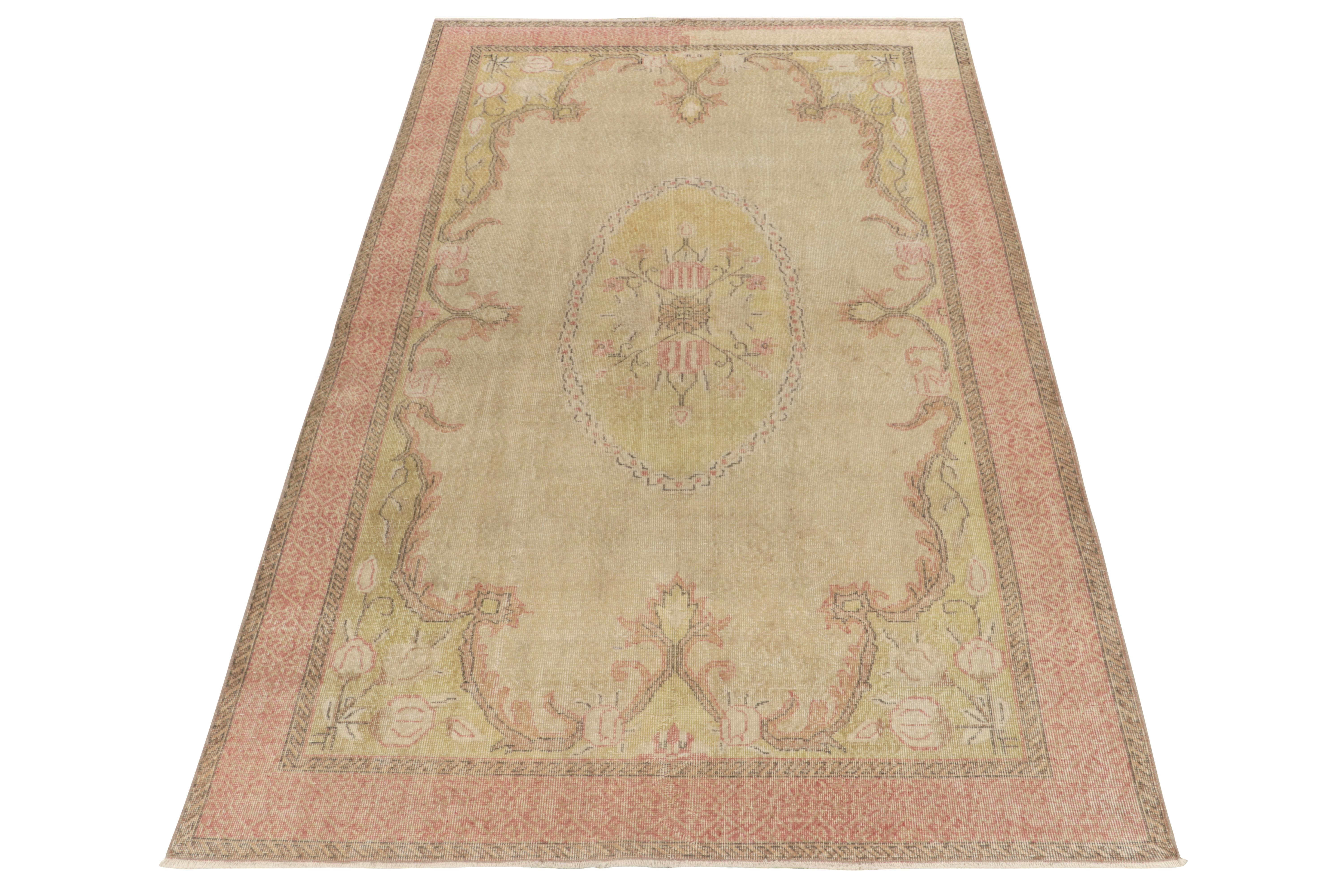 Hand-knotted in wool, a vintage 7x10 rug from a coveted Turkish designer, is commemorated in Rug & Kilim’s Mid-Century Pasha Collection. 

The delicious 1960s piece witnesses floral patterns in beige and pink with an impossible subdued accent as