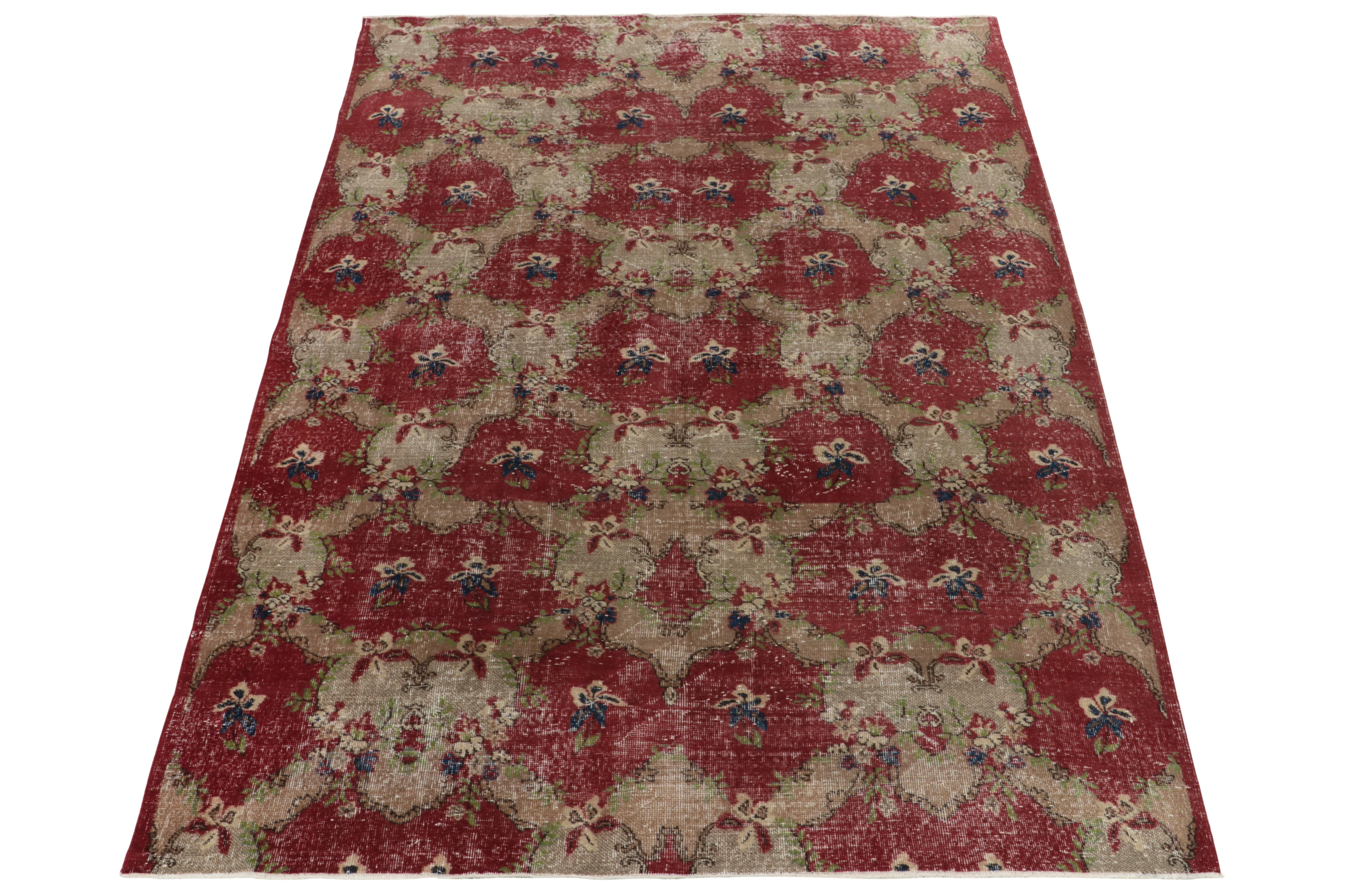 Hand-knotted in wool from Turkey circa 1960-1970, a vintage 7x10 mid-century modern rug joining Rug & Kilim’s commemorative Mid-Century Pasha Collection. 

The piece sits fabulously in velvet red against beige-brown with kisses of green for an