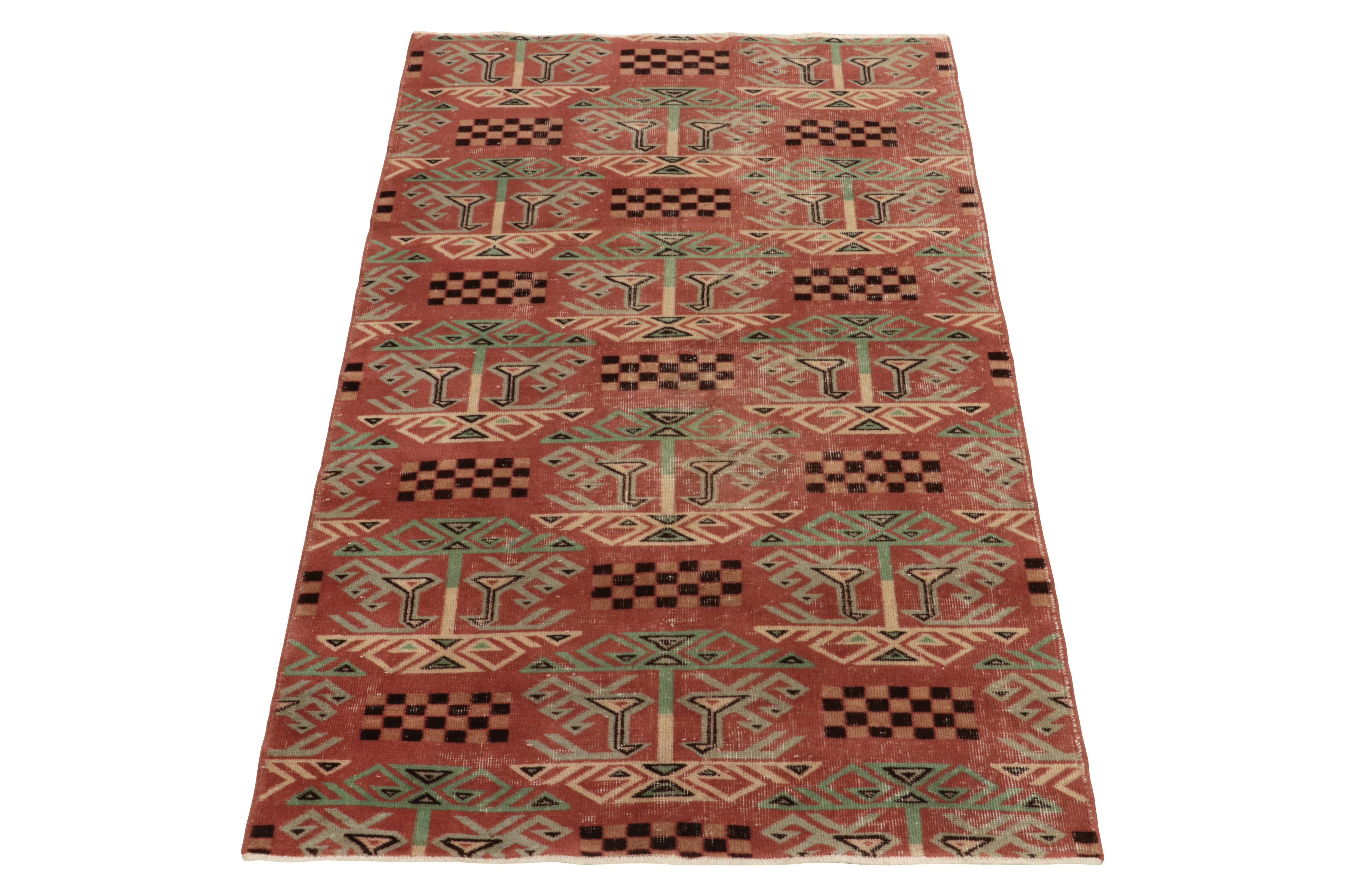 Hand-knotted in wool from Turkey circa 1960-1970, a vintage 4x6 distressed rug from bold Turkish atelier. Joining the discerning curtains from Rug & Kilim’s commemorative Mid-Century Pasha Collection. 

The graphic piece showcases an interesting