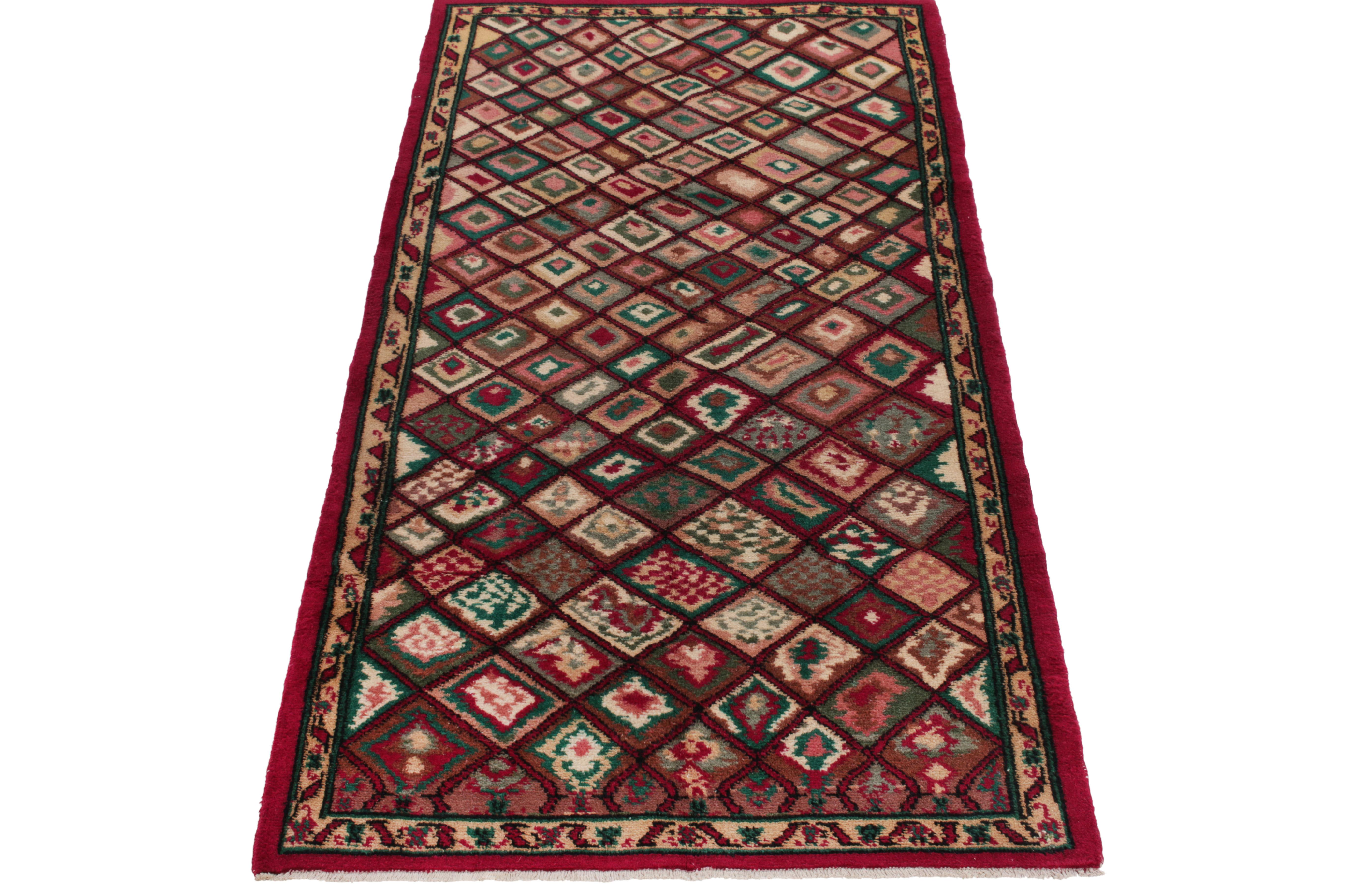 Hand-knotted in wool from Turkey circa 1950-1960, a 4x7 vintage rug from a bold multidisciplinary Turkish designer commemorated in Rug & Kilim’s Mid-Century Pasha Collection. The rug enjoys a continuous geometric pattern in scarlet red & forest