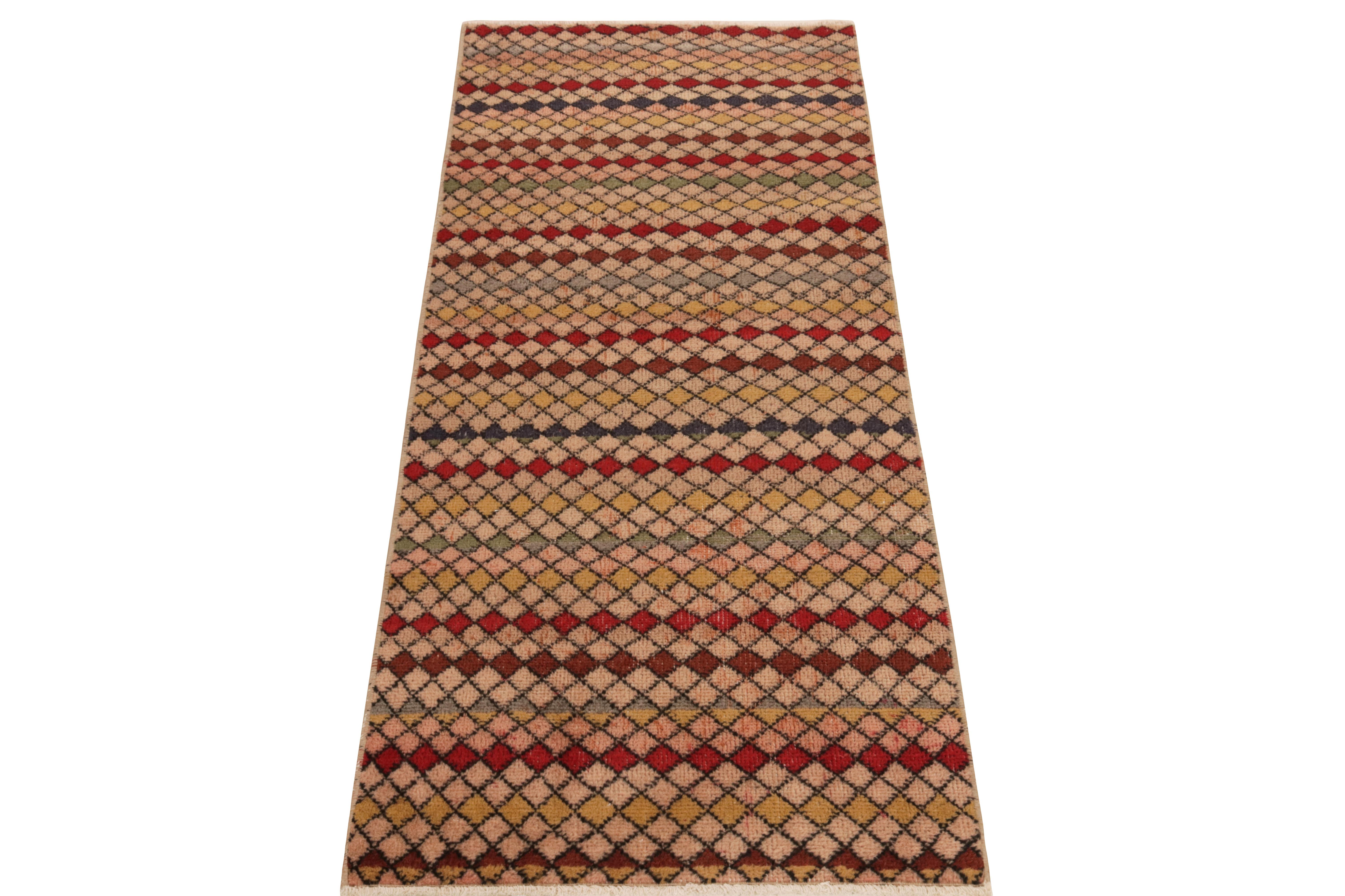 From Rug & Kilim’s Mid-Century Pasha collection, a 1960s vintage runner celebrating the works of a bold multidisciplinary designer from Turkey. 

Hand-knotted in wool, this 2x6 rug revels in a scintillating diamond pattern that lends an