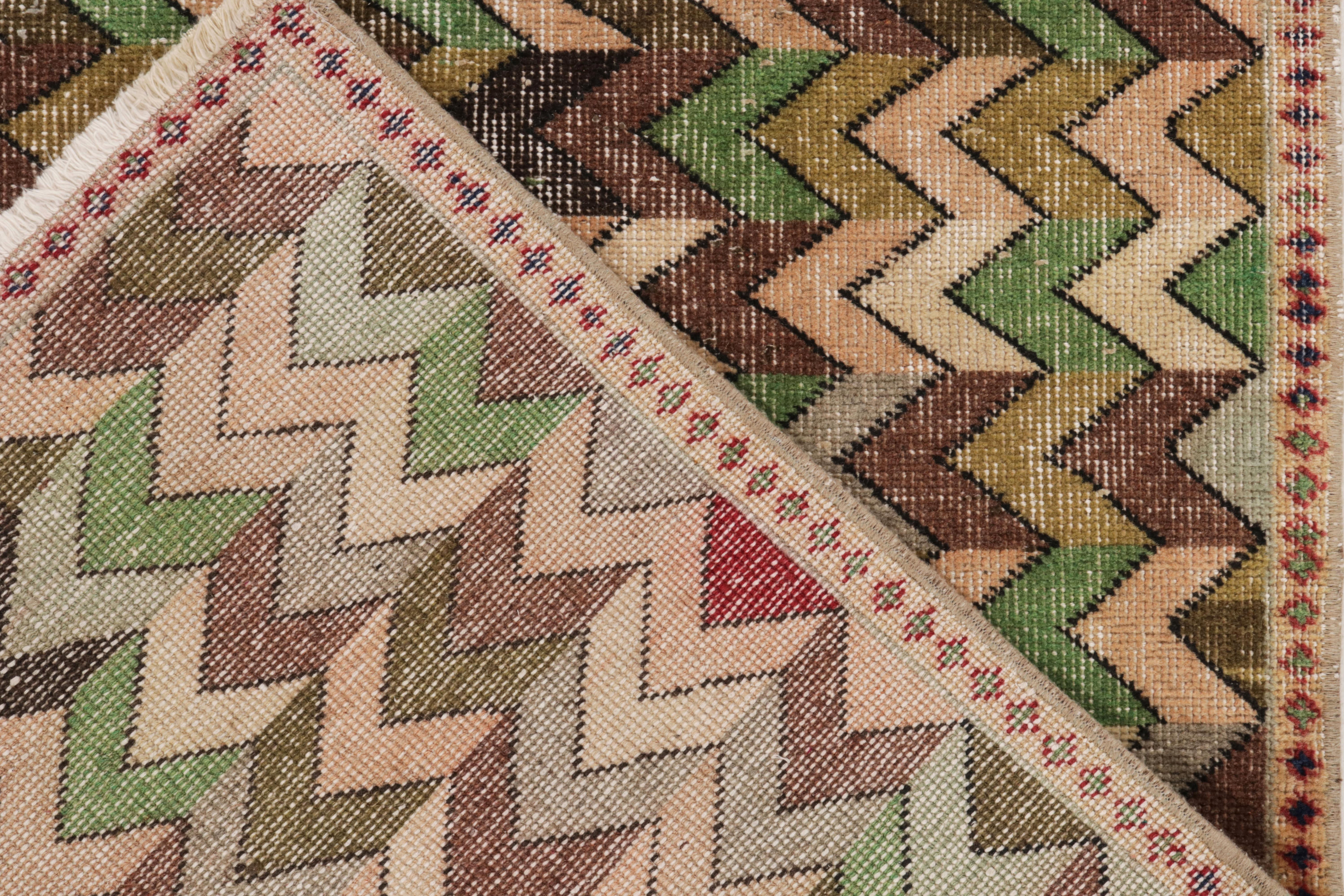 Hand-Knotted 1960s Vintage Distressed Runner in Green, Beige Chevron Patterns by Rug & Kilim For Sale