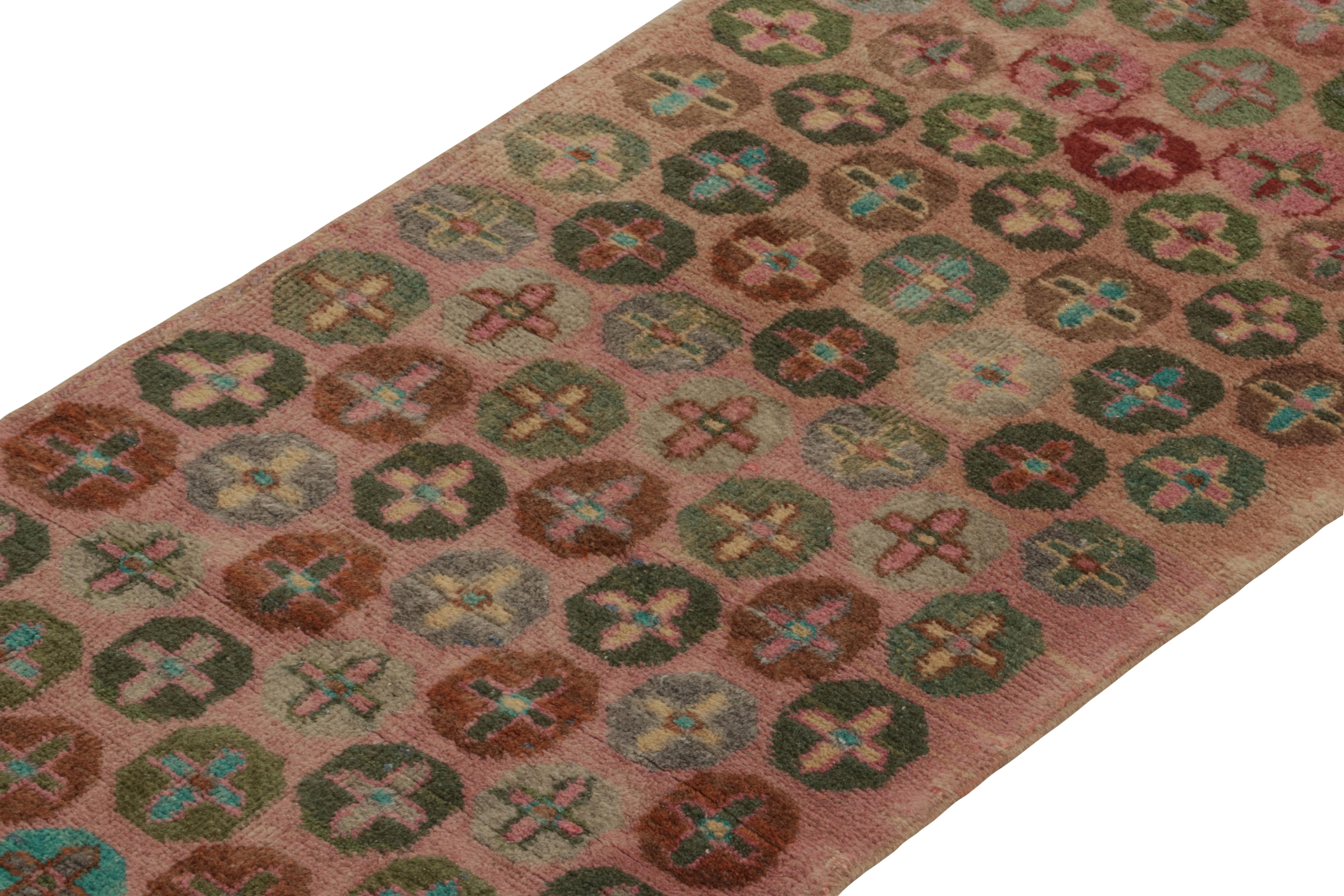 Hand-Knotted 1960s Vintage Distressed Runner in Pink, Red Geometric Patterns by Rug & Kilim For Sale