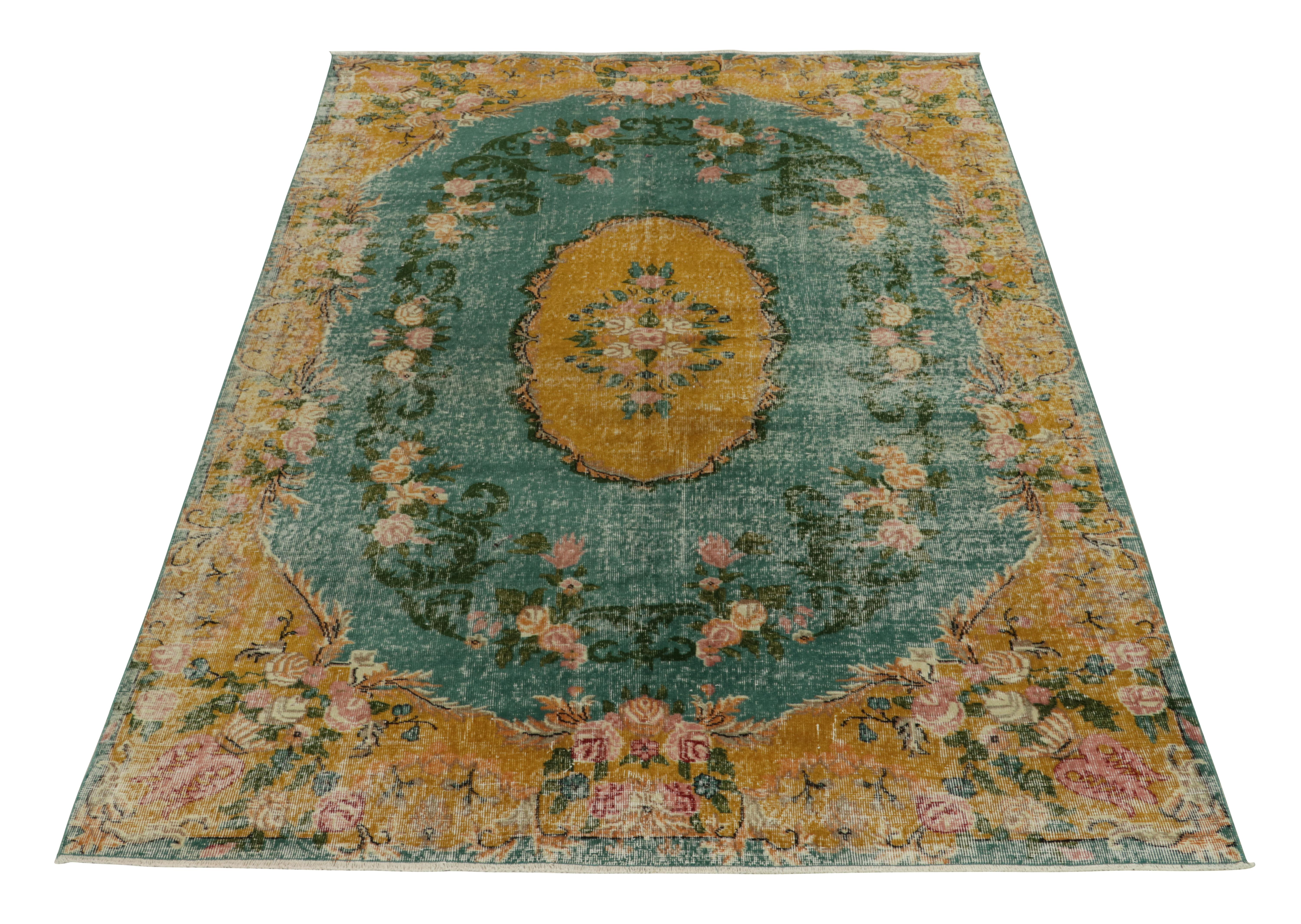 Hand-knotted in wool from Turkey circa 1960-1970, a vintage 7x10 distressed rug from a bold Turkish artist, joining Rug & Kilim’s Mid-Century Pasha Collection. 

Enjoying a beautiful medallion with an elegant European sensibility clearly uniquely