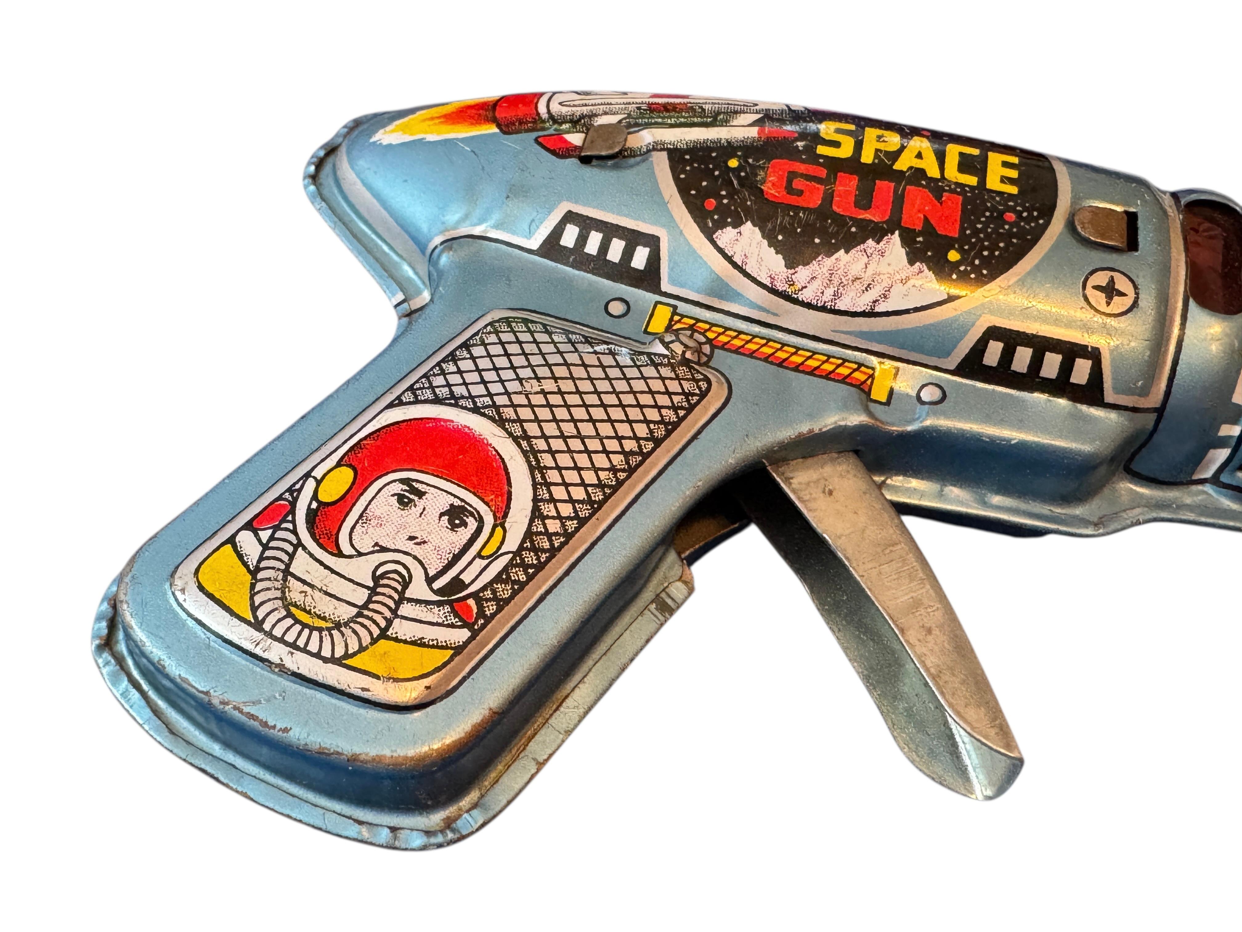 Metal 1960s Vintage Haji Japanese Tin Toy Friction Litho Astronaut Rocket Space Gun