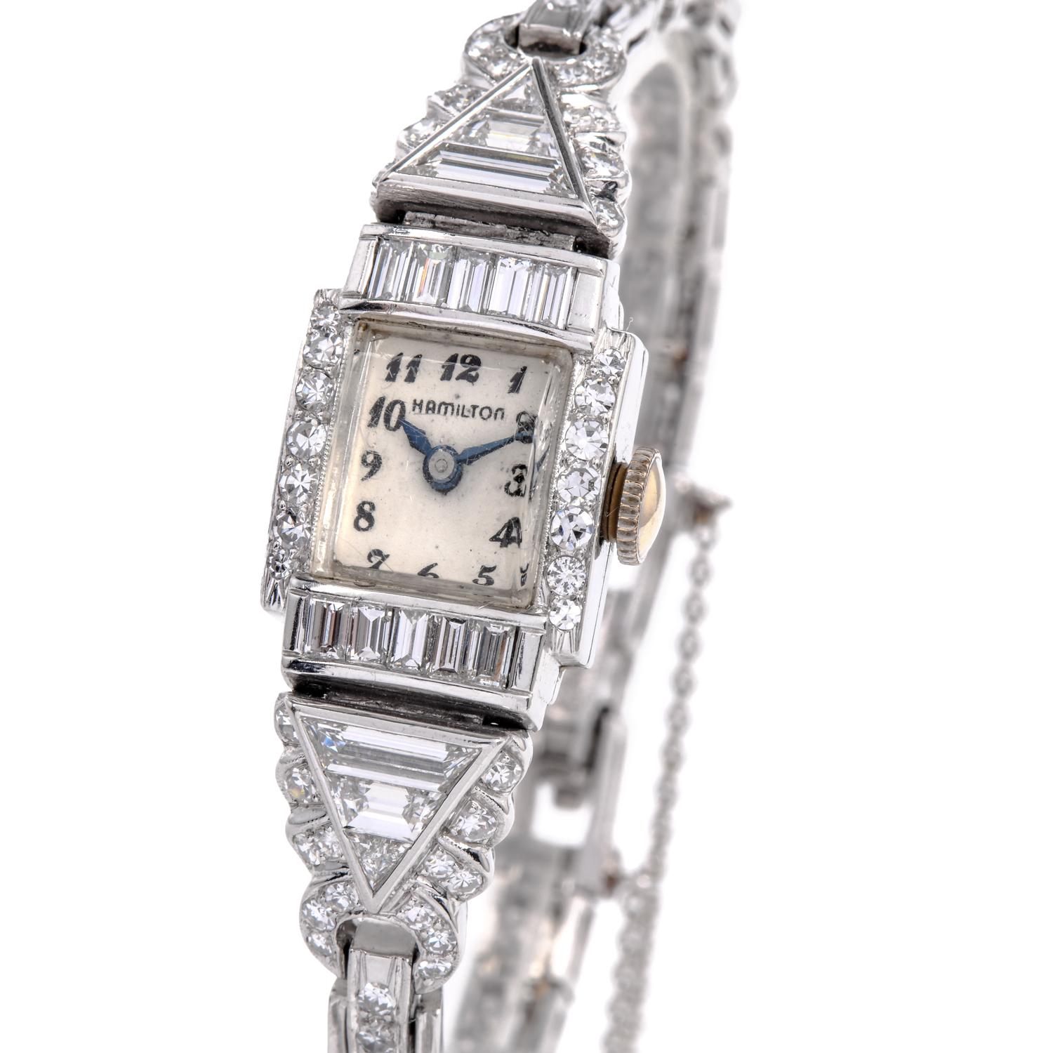 This Vintage Hamilton Ladie's cocktail is watch crafted in solid Platinum. With an off-white dial & silver-tone hand markers. Manual mechanical winding movement. It with A round diamond accented decorative link bracelet of approximately 6. inches on