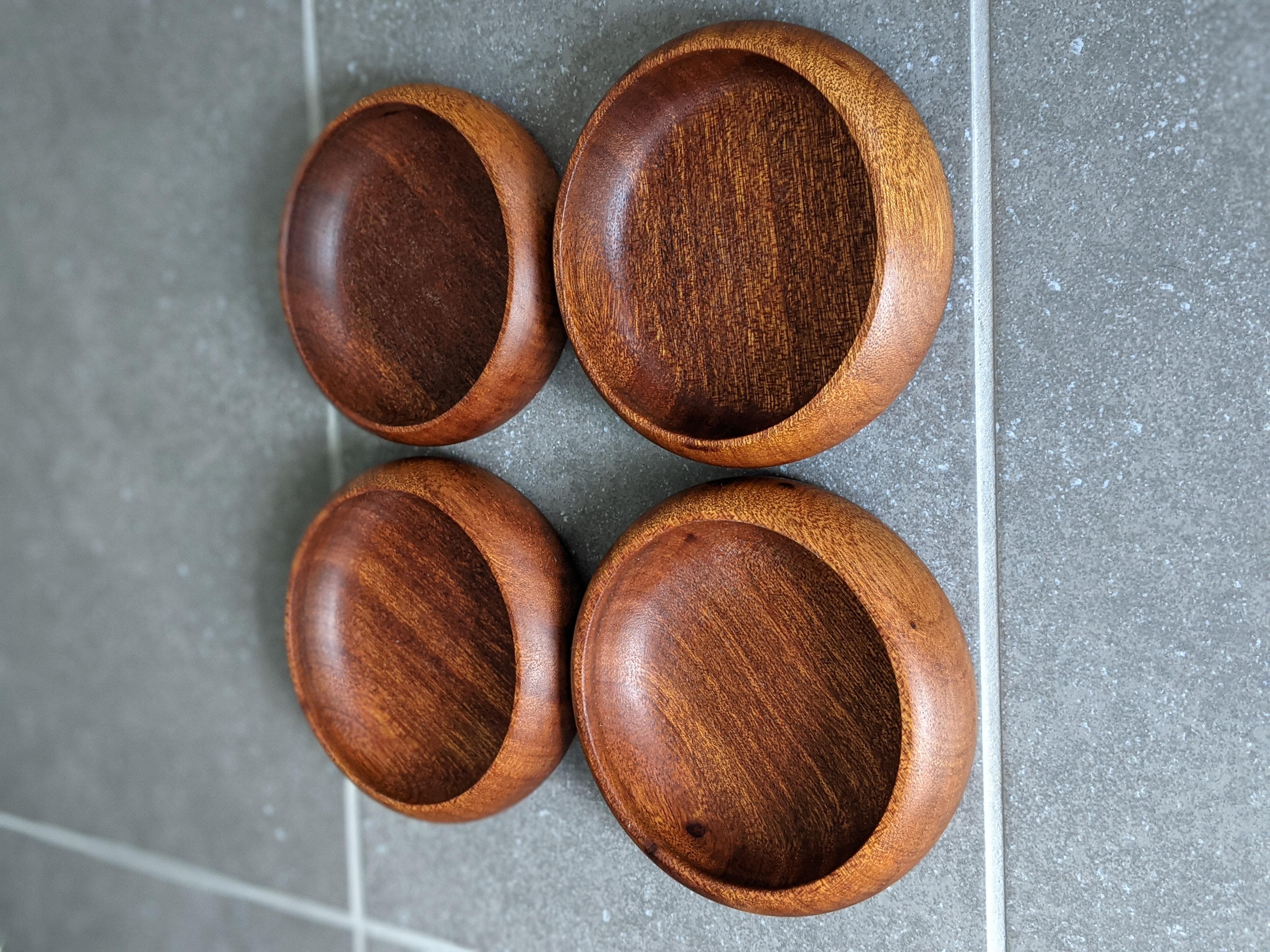 Set of smaller-format hand carved teak bowls or trays.

In the style of Jens Quistgaard for Dansk.

Beautiful and versatile set.
