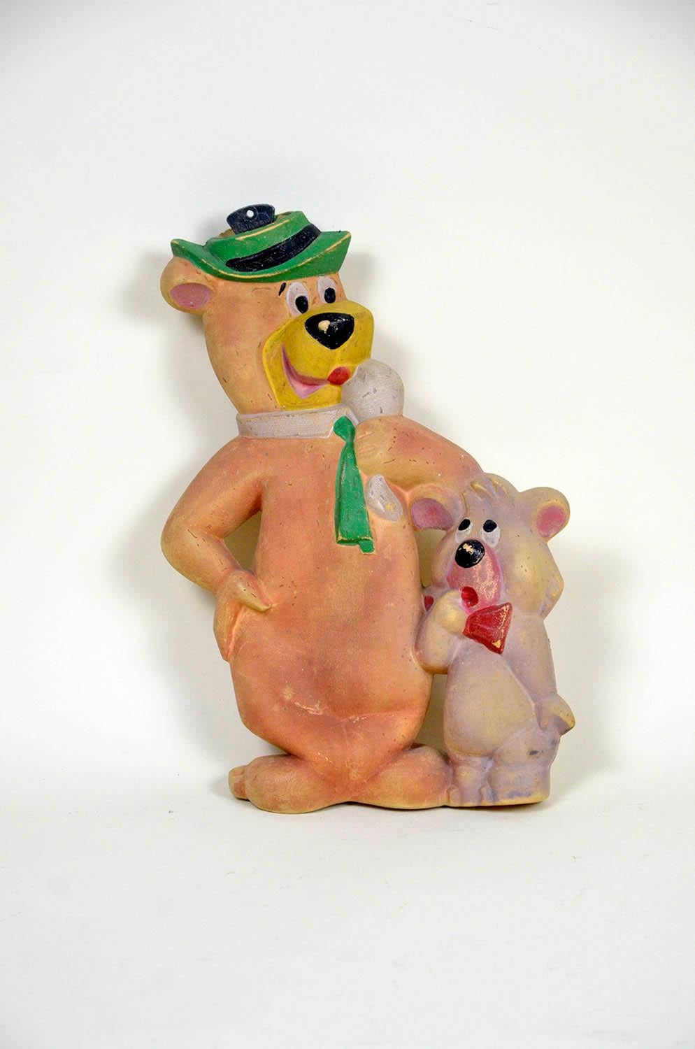 Vintage Hanna-Barbera Yogi Bear and boo-boo hot-water bottle made in Spain in the 1966s by Duarry.

Copyrighted Hanna-Barbera and marked Duarry.

This hot-water bottle is to be used as display only.