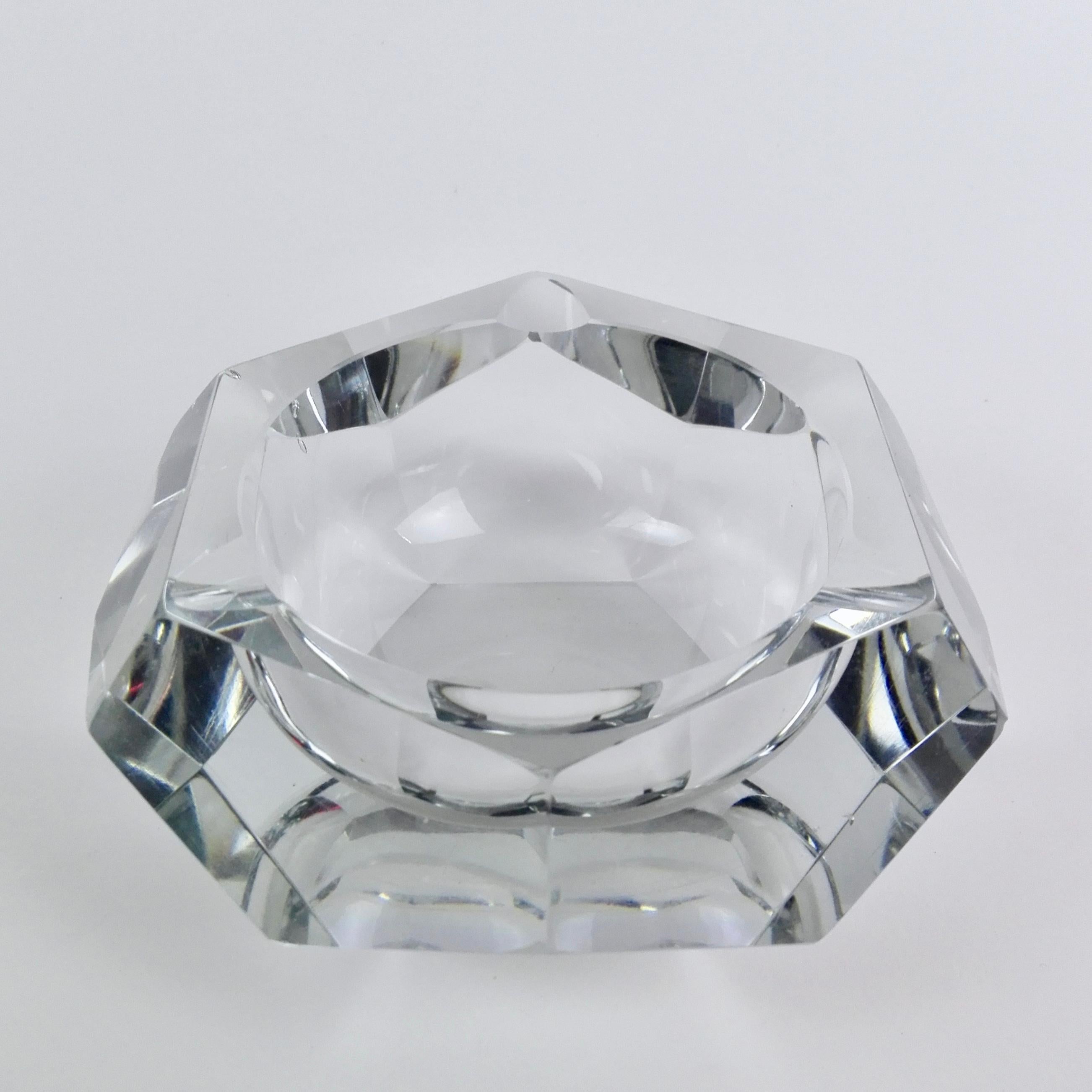 Beautiful Italian 1960's ashtray with faceted shaped cut sides that widen from a hexagonal base, reflecting light in a stunning way.
A vintage ashtray is always a must in quality, durability and design.
This beautiful creation with its