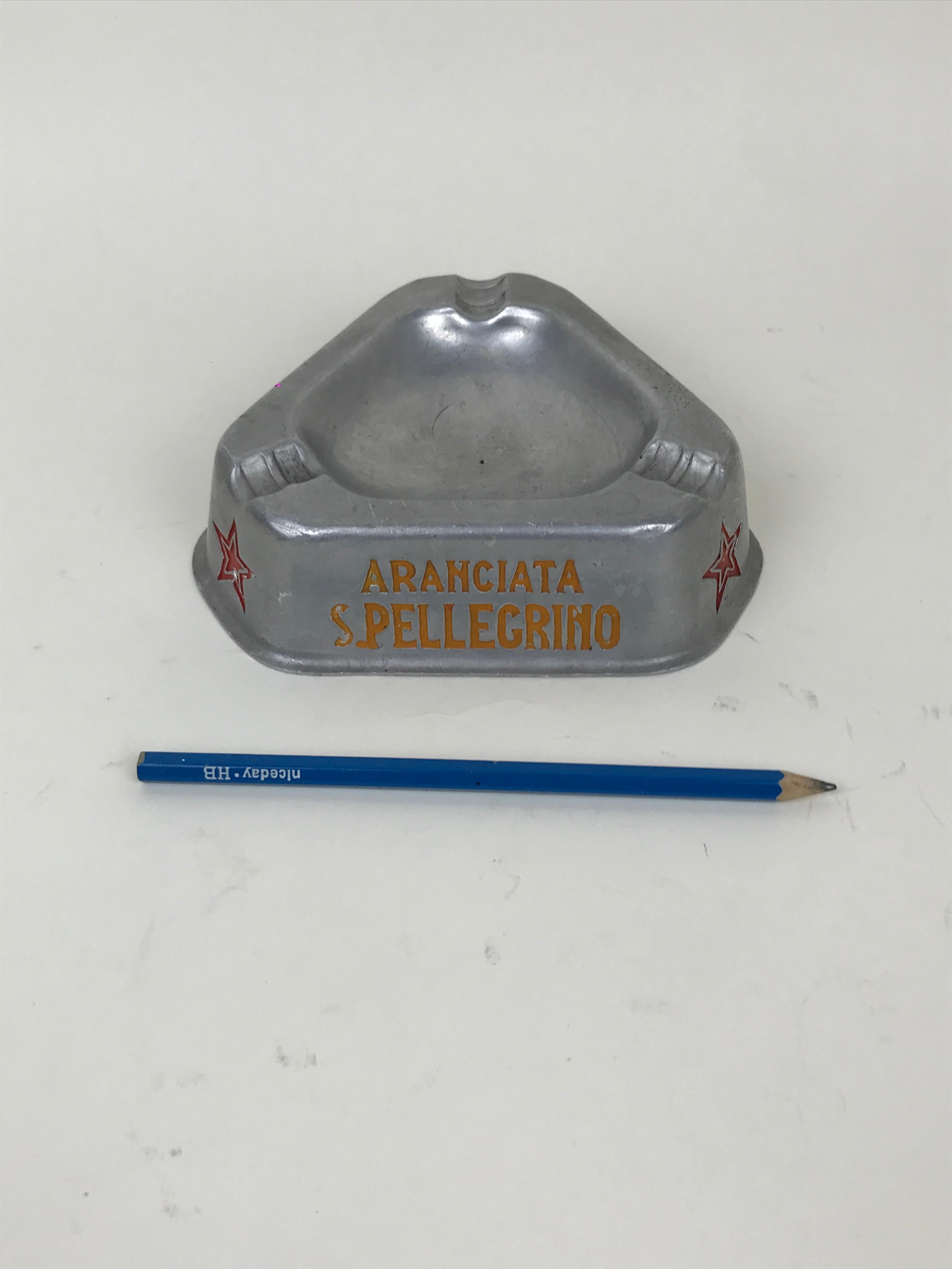 Vintage Italian advertising aluminum triangular ashtray San Pellegrino made in Italy in the 1960s.

Each side of the ashtray presents a advertising logo of a different San Pellegrino product in different color: Green ( Acqua Minerale San
