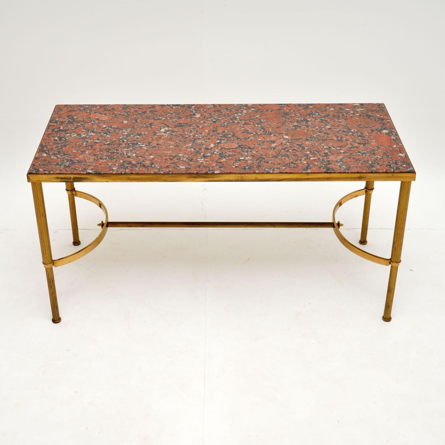 A stylish and beautifully made vintage coffee table in solid brass, with an inset marble top. This was made in Italy and dates from circa 1960s.

It is of superb quality, the solid brass frame is beautifully shaped with a wishbone shaped stretcher