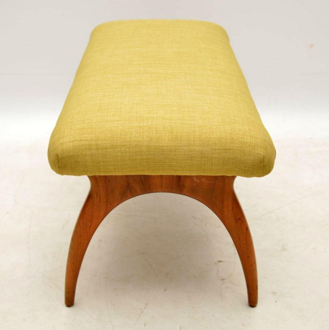 A beautifully styled and very well made vintage foot stool, this was made in Italy and dates from the 1960s. It’s very well made with a solid walnut frame, which is clean, sturdy and sound, with only some extremely minor surface wear. We have had