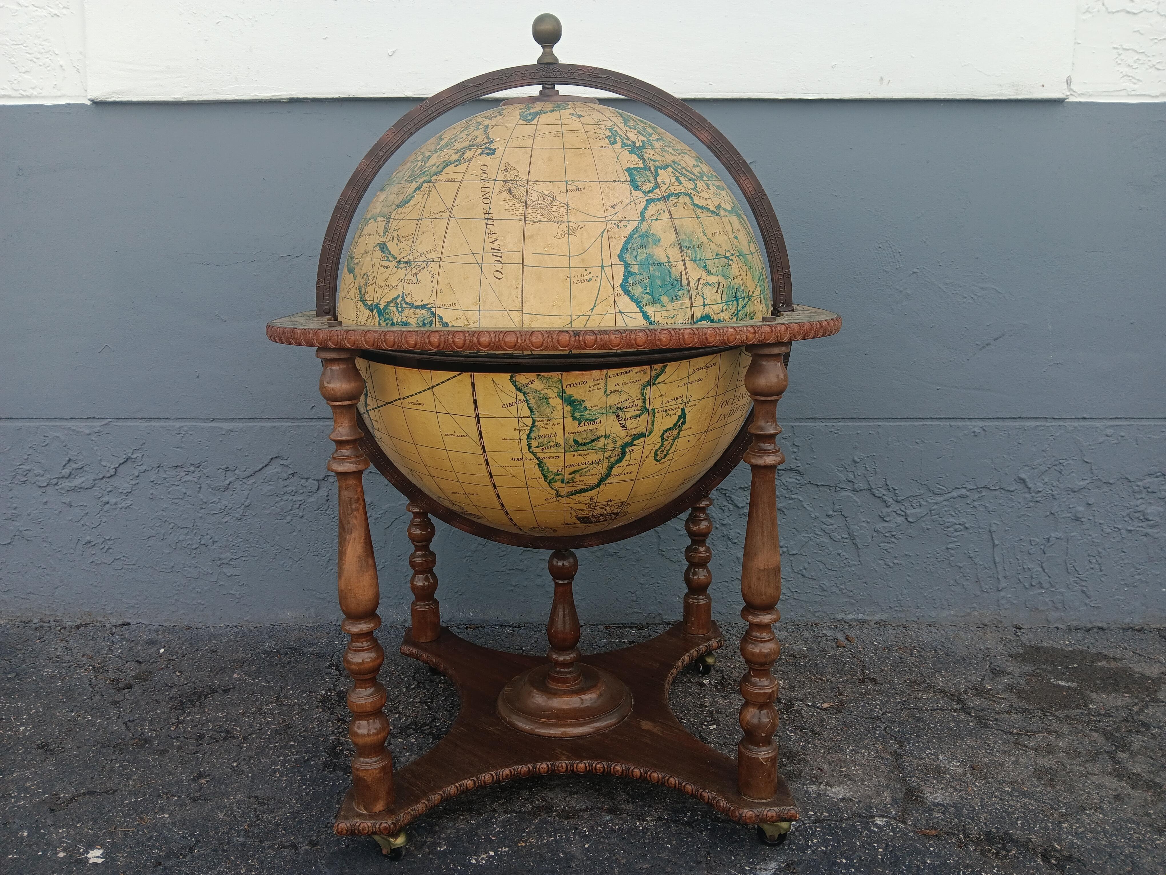 1960's Vintage Traditional World Globe Dry Bar. Top of globe opens to reveal dry bar storage.