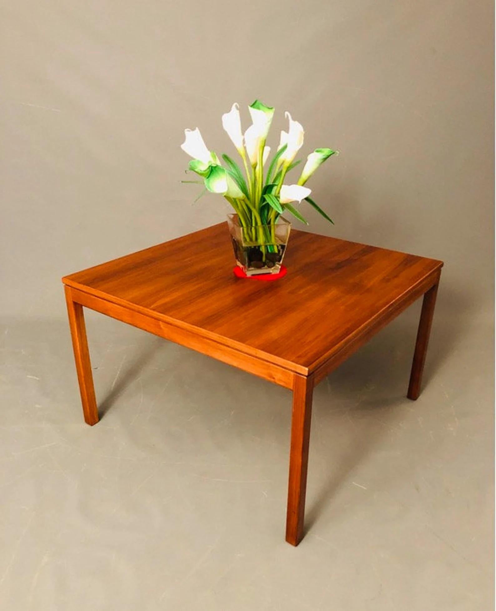 Beautiful mid-century square walnut coffee table by Jens Risom Co. with stunning wood grain was completely restored. Heavy and sturdy and ready for a new home.

Dimensions:
32” x 32” inches.
Height: 20” inches.