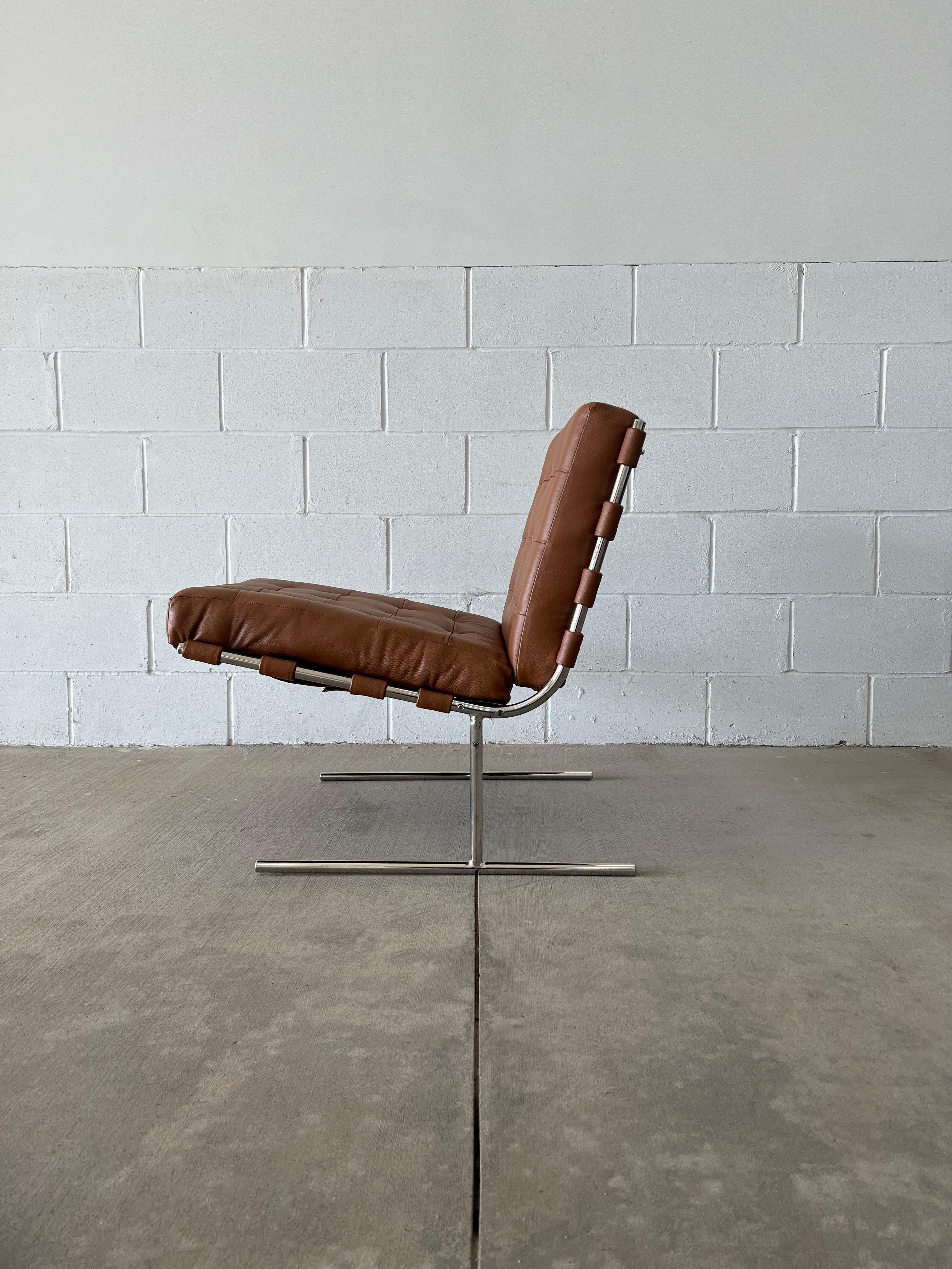 An iconic design by one of the founding fathers of Brazilian Modernism, the T invertido Lounge chair or commonly known as the Oxford lounge chair (unmarked) by Jorge Zalszupin feels like the answer to the ubiquitous Barcelona chair by Ludwig Mies