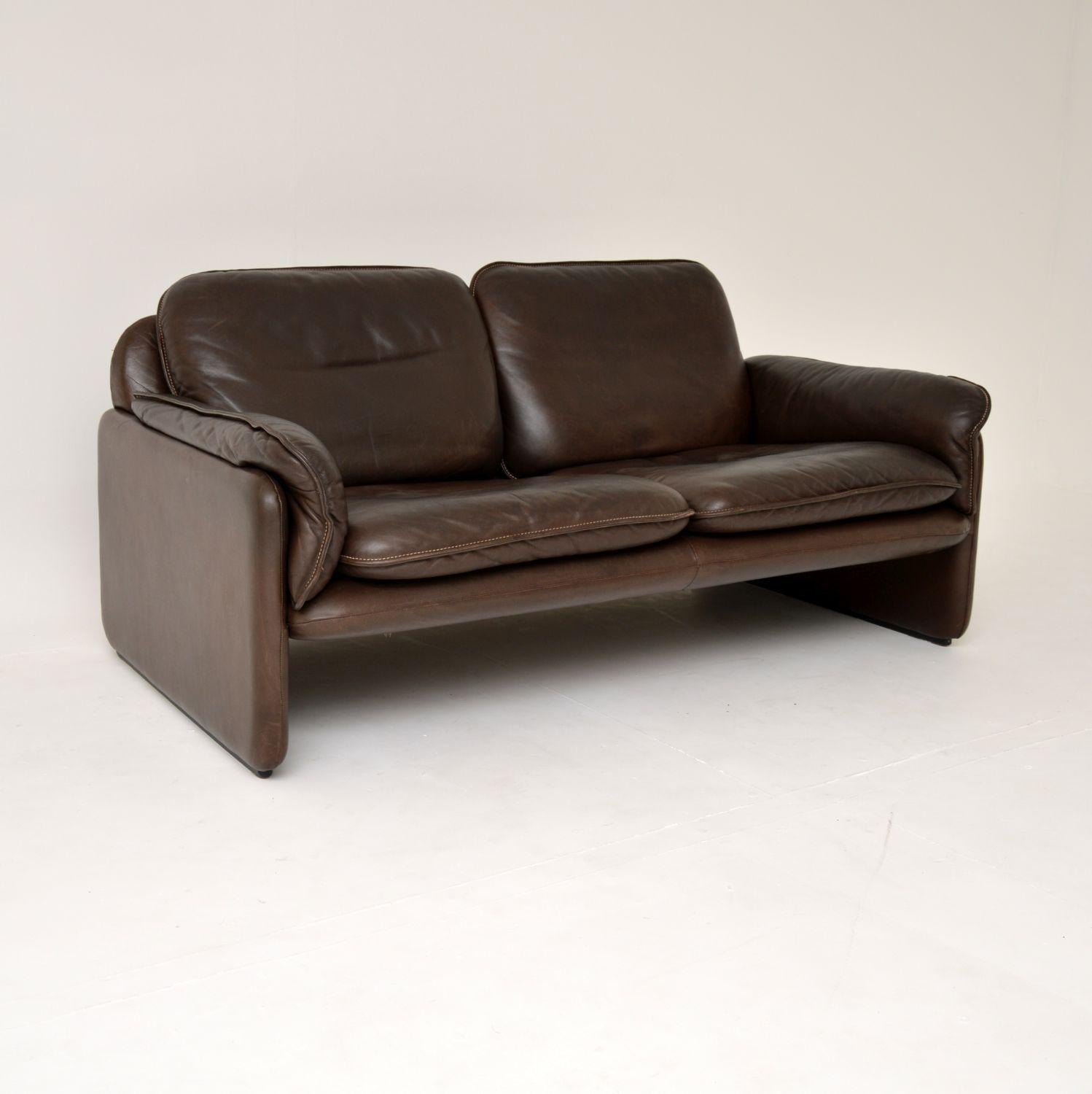 A stylish, very comfortable and extremely well made two seat leather sofa by De Sede. This is the model DS 61, it was made in Switzerland and dates from the 1960-70’s.

As with all De Sede furniture, the quality is outstanding. The brown leather