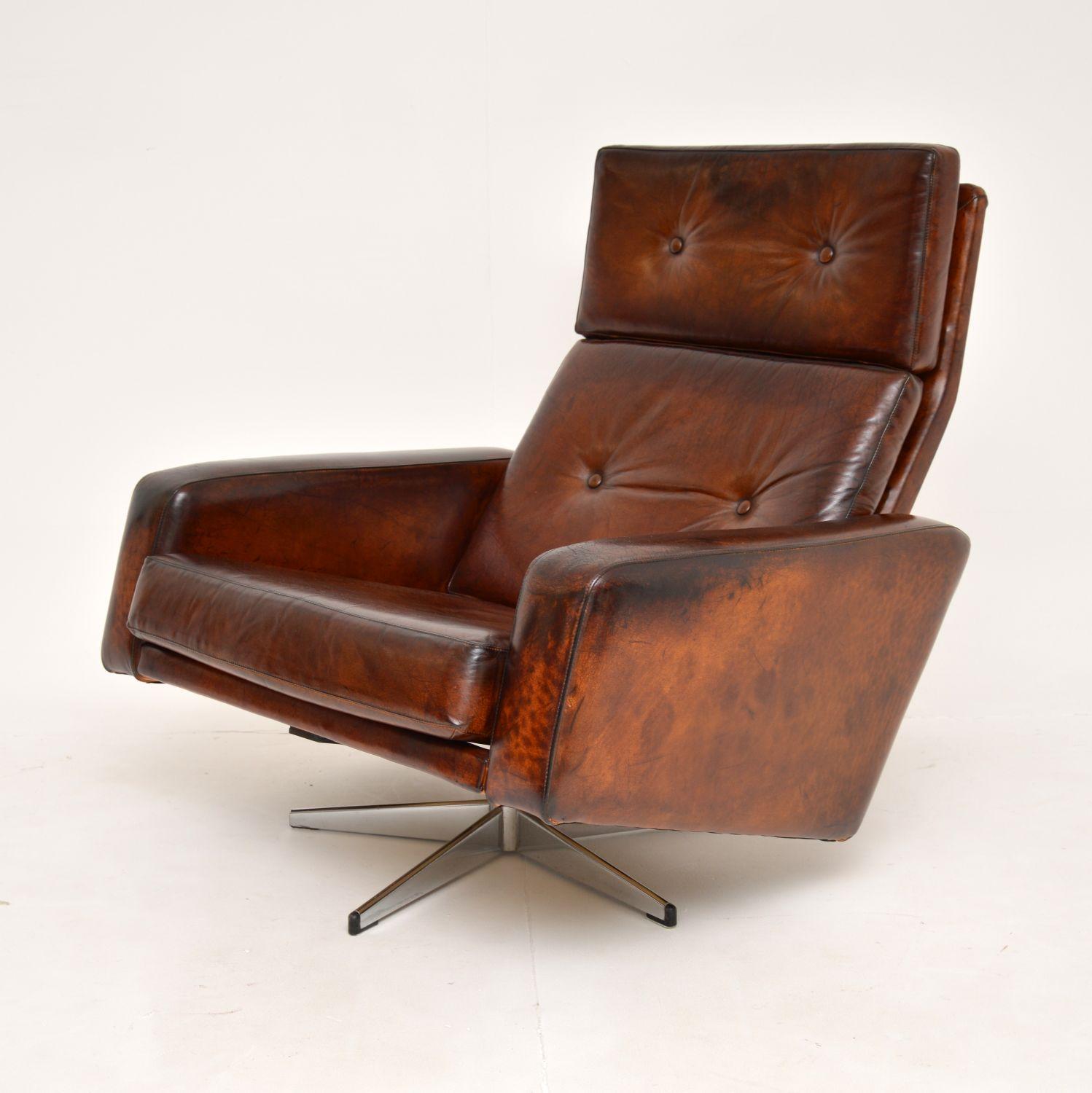 A superb and iconic design by Robin Day, this is the ‘Leo’ chair in brown leather and chrome. It was made by Hille in England, it dates from the 1960’s.

This is of amazing quality and is extremely comfortable. It has lovely proportions, with a