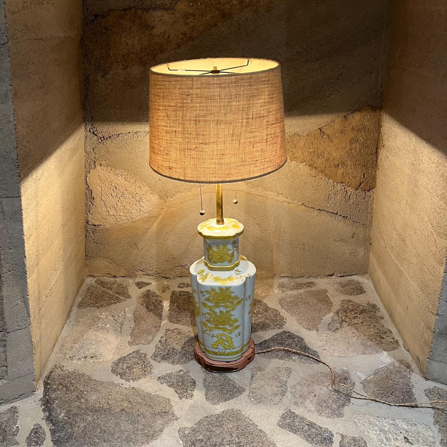 1960s vintage Marbro lamp Co oriental white & yellow ceramic porcelain table lamp on wood base
Measures: 38 tall tip of finial 8.38 width x 7.75 depth
Double Socket Rewired, tested and working.
New twisted gold silk cord. New plug. Wood base is