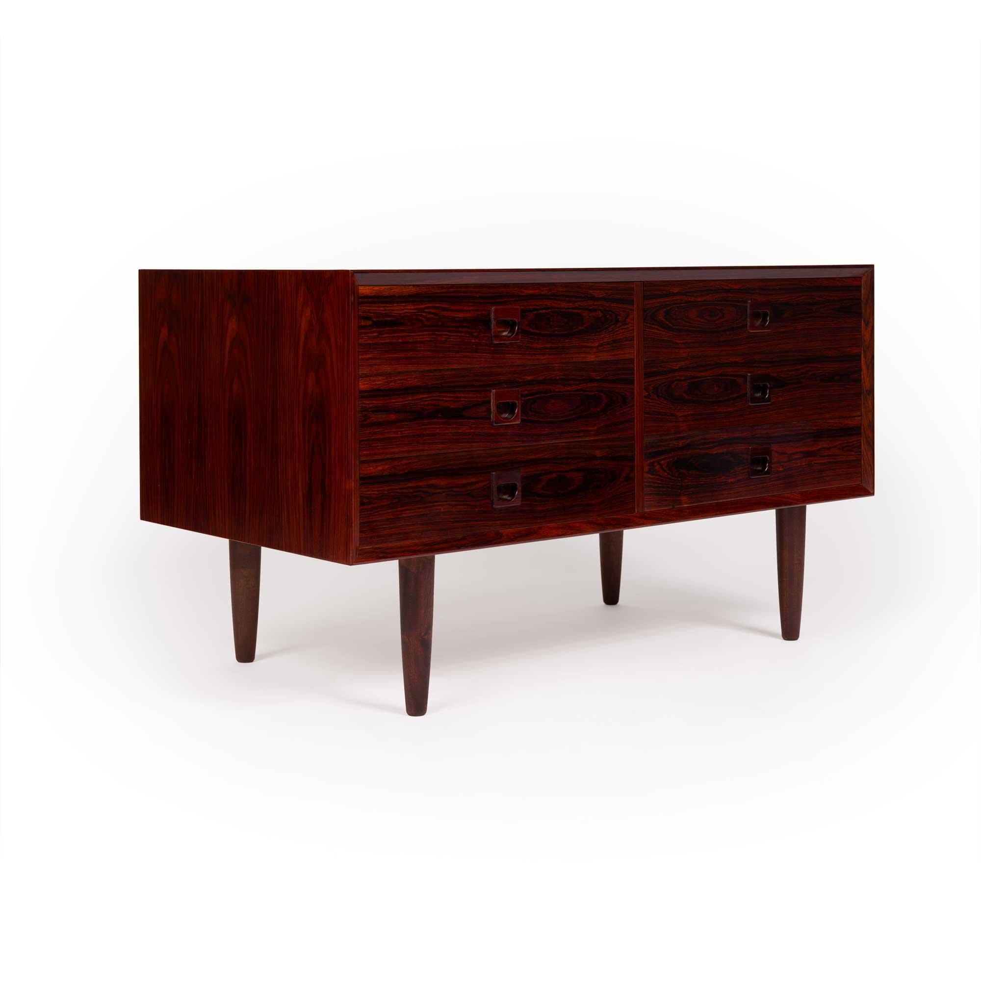 Brouer Møbelfabrik, often referred to simply as Brouer, was a Danish furniture manufacturer known for producing high-quality, minimalist furniture in the 1960s and 1970s. Specializing in wood, especially teak and rosewood, Brouer focused on crafting