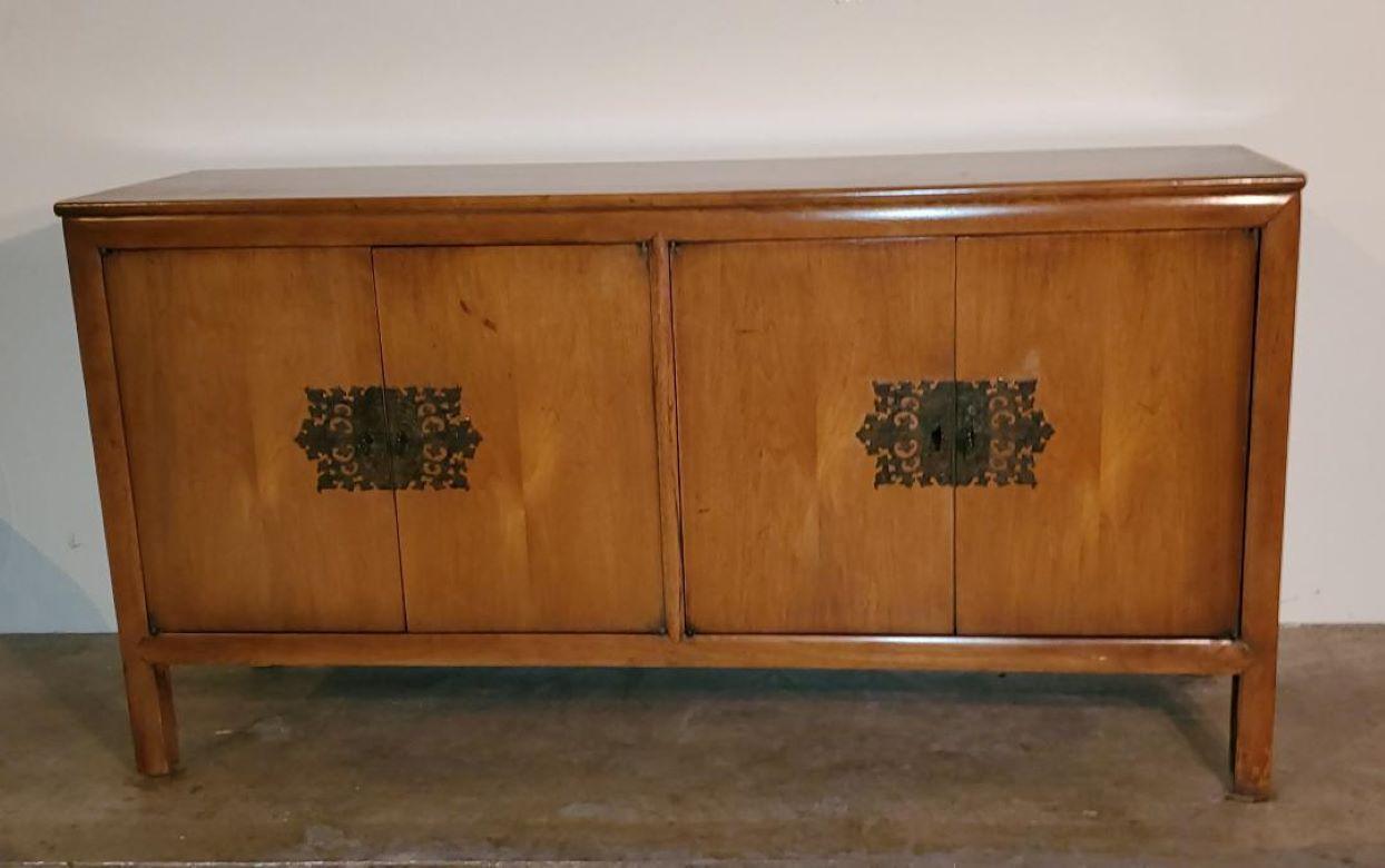 Vintage Mid Century Modern Maple Credenza - Sideboard or Buffet.
This Piece Is Sold And Sturdy Construction. 
Left Side Of This Beautiful Buffet, Sideboard, Credenza Has Ample Shelves And On The Right Three Notched Pullout Drawers.
The Large Ornate