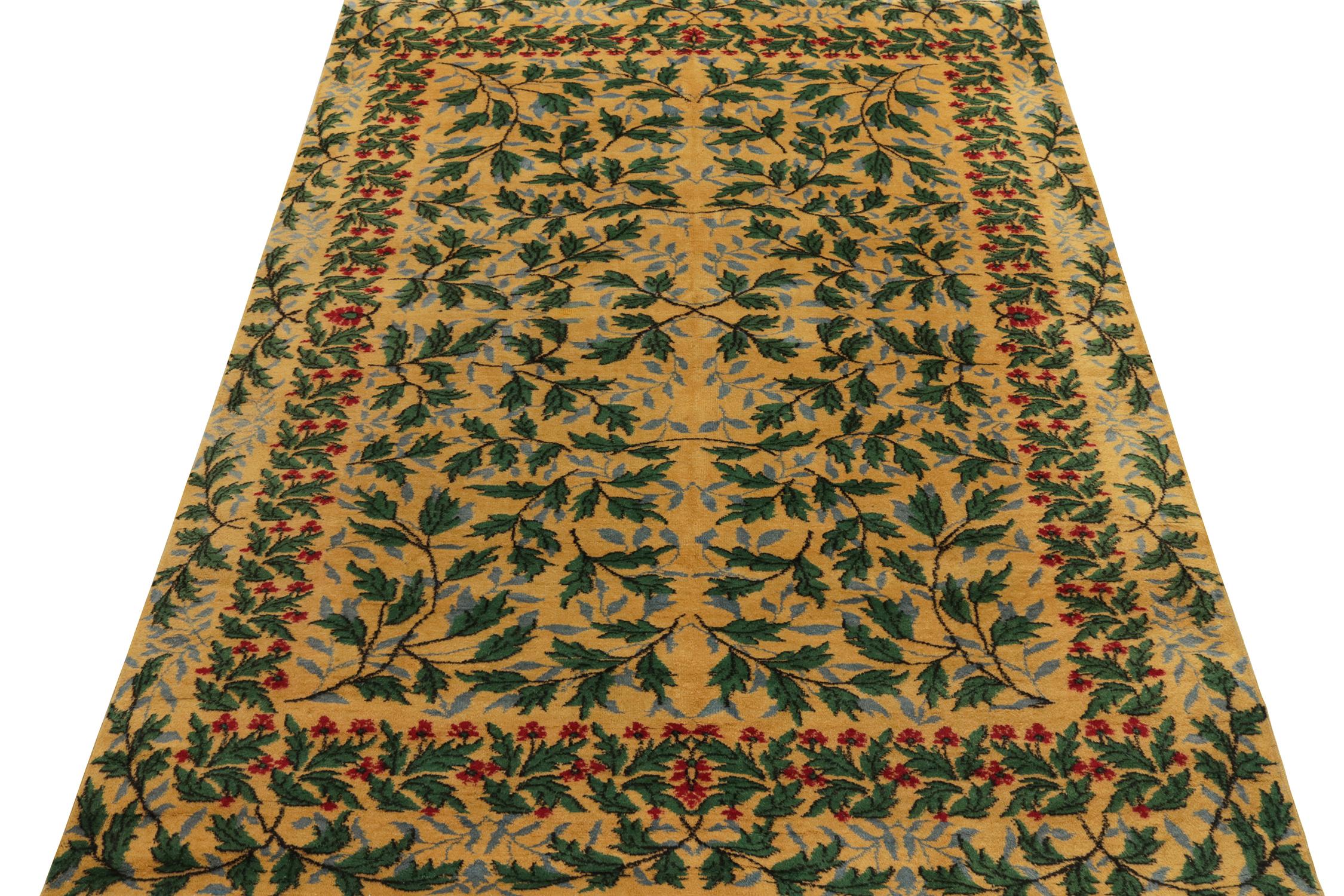 Hailing from Rug & Kilim’s mid-century Pasha collection, a 1960s piece celebrating the works of a bold Turkish designer. This 7x10 rug carries a sprawling foliage pattern in deep green, light blue with scarlet red punctuations on a gold