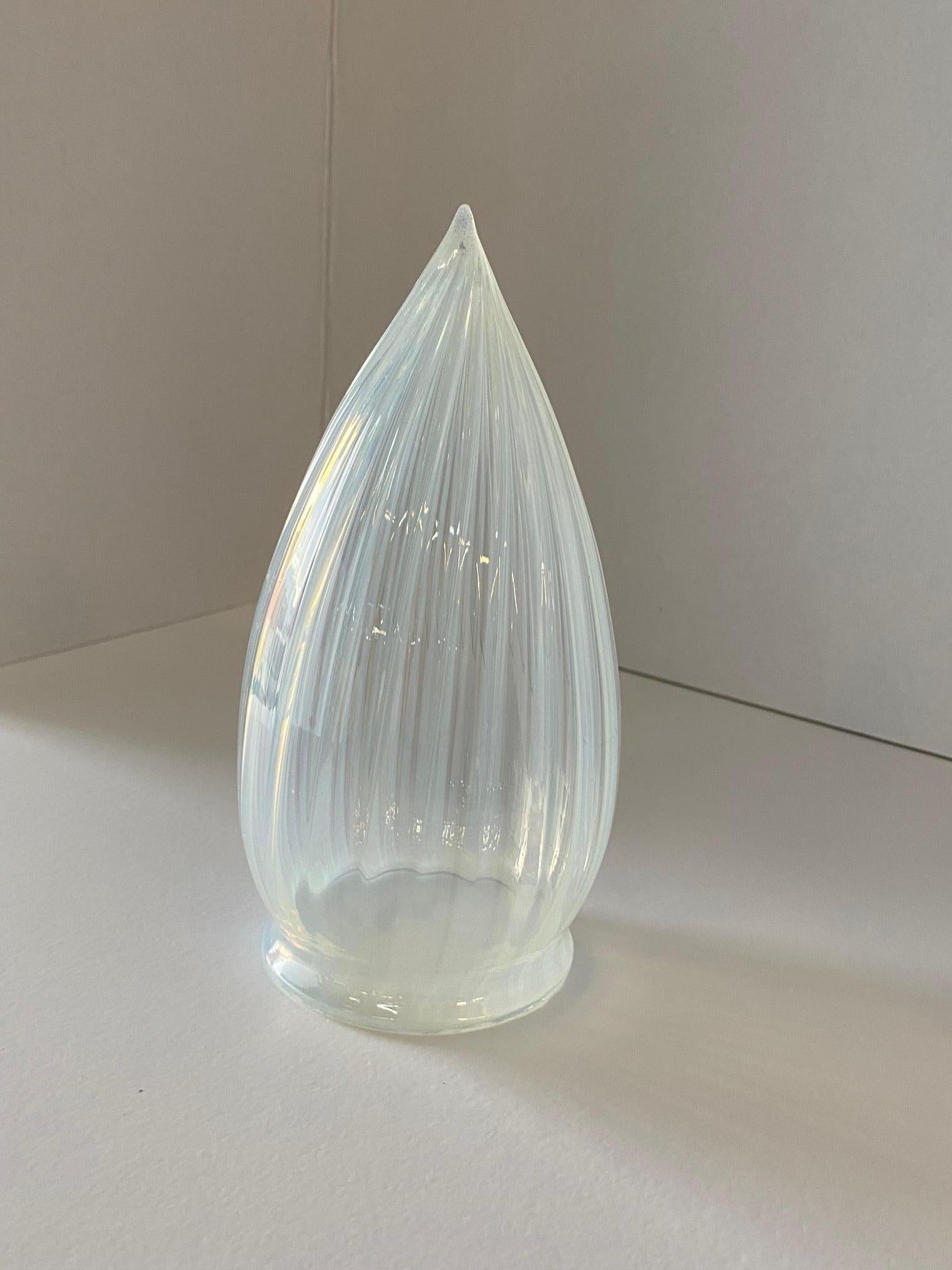 Vintage art deco vaseline opalescent teardrop swirl glass bullet shade. Heavy glass with a translucent blue hue with masterfully perfectly done hand-blown vertical etched liked swirls , circa 1960s possible made in Italy or USA in the 1960s this is