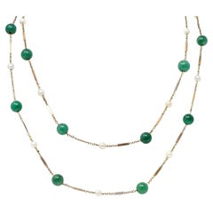 1960's Retro Pearl Aventurine 14 Karat Gold 62 Inch Long Station Necklace