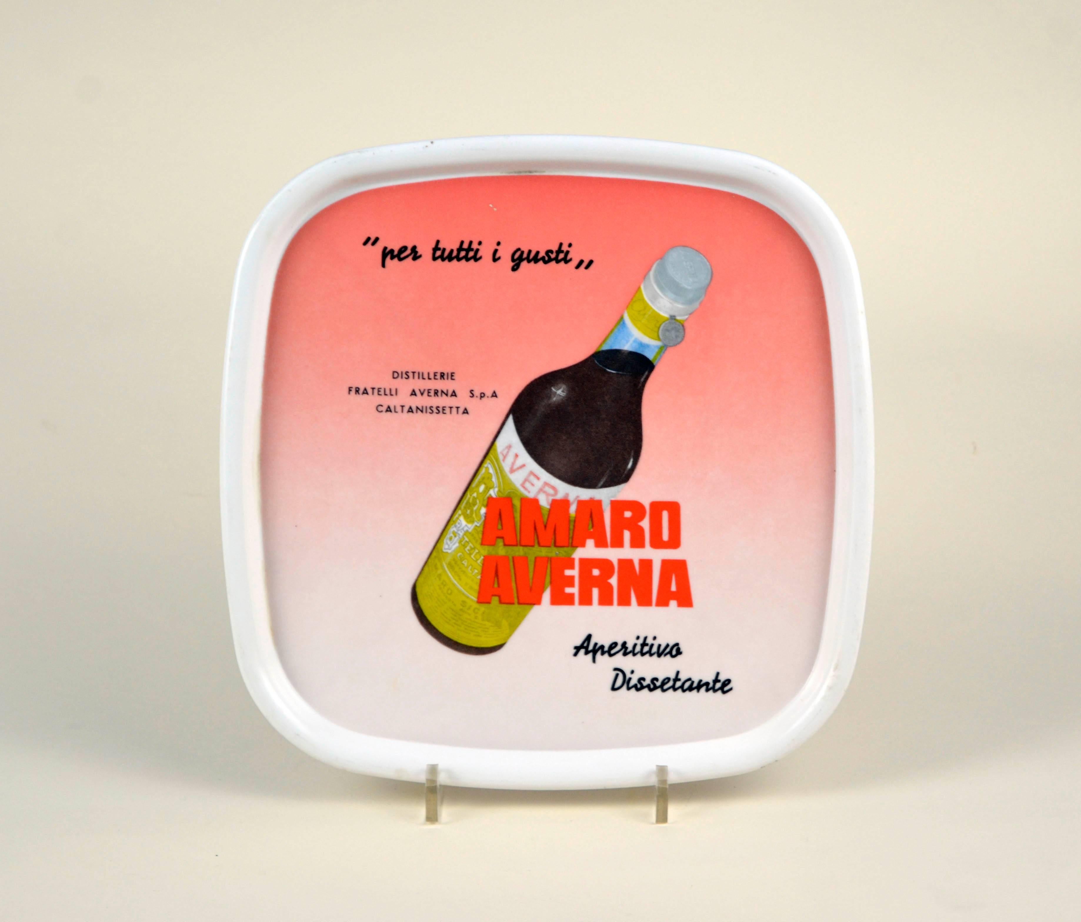 Vintage white plastic rounded bar tray made in Belluno, Italy by 3/A.P for Amaro Averna.

The tray shows an image on bottle of Amaro Averna with slogan 