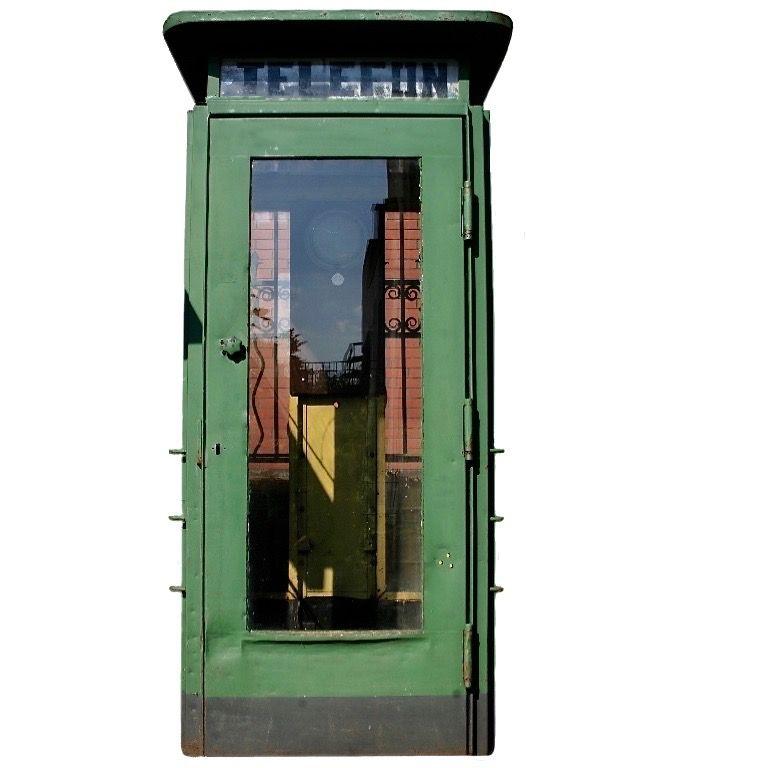 The original Polish street telephone booth, from the 1960s, used in Warsaw until the mid-1980s.
Very solid steel construction made of a double profiled, pressed sheet. In the upper part, there is an illuminated coffer with the word 