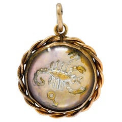 1960's Vintage Reverse Carved Rock Crystal 14 Karat Gold Scorpio Zodiac Charm