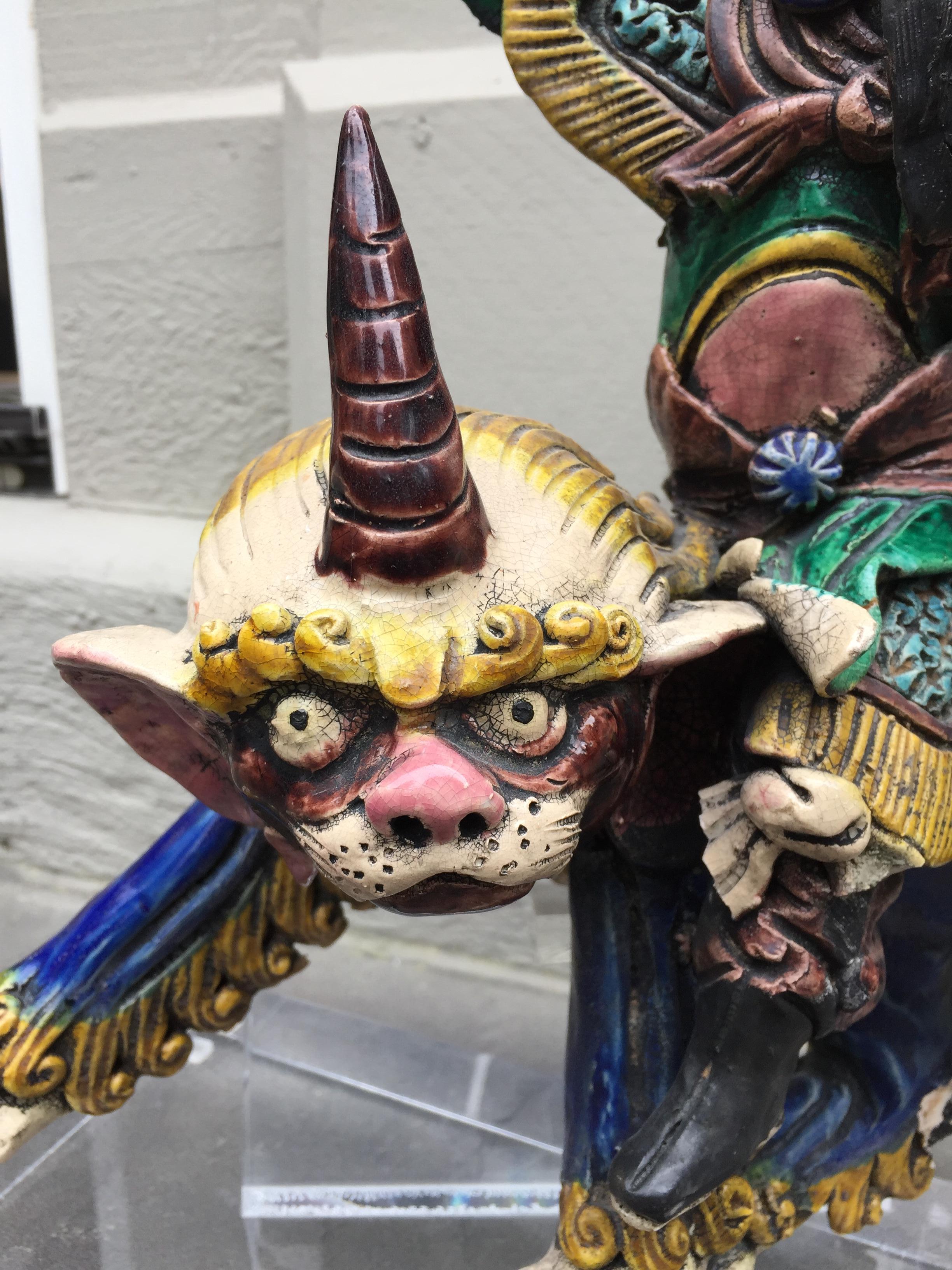Hand-Carved Asian Statue on Lucite Pedestal Samuri Riding Foo Dog  For Sale
