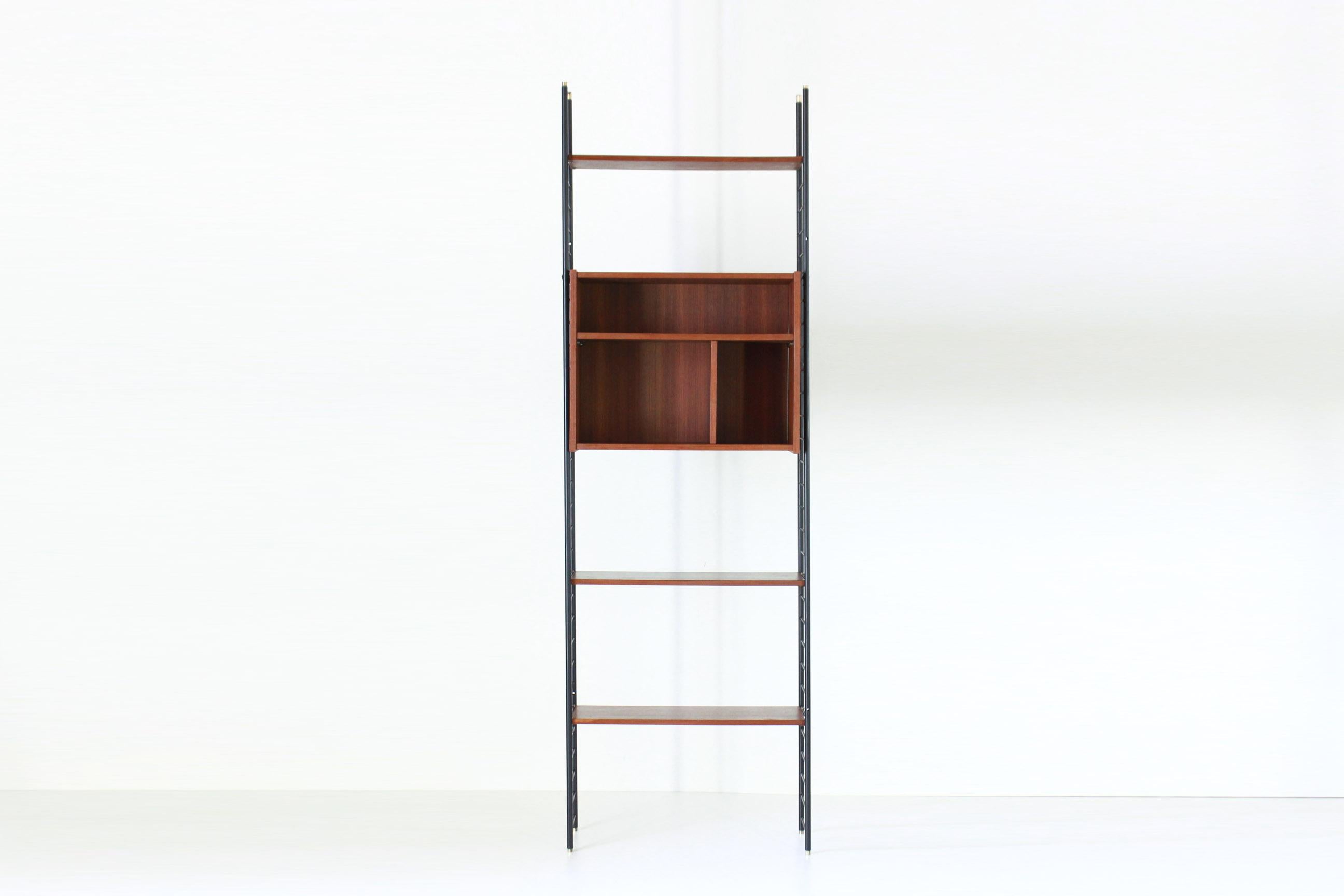 A 1960s vintage Scandinavian bookshelf with teak shelves and iron refined black structure. Elegant minimal style. In very good conditions with only few signs of time.