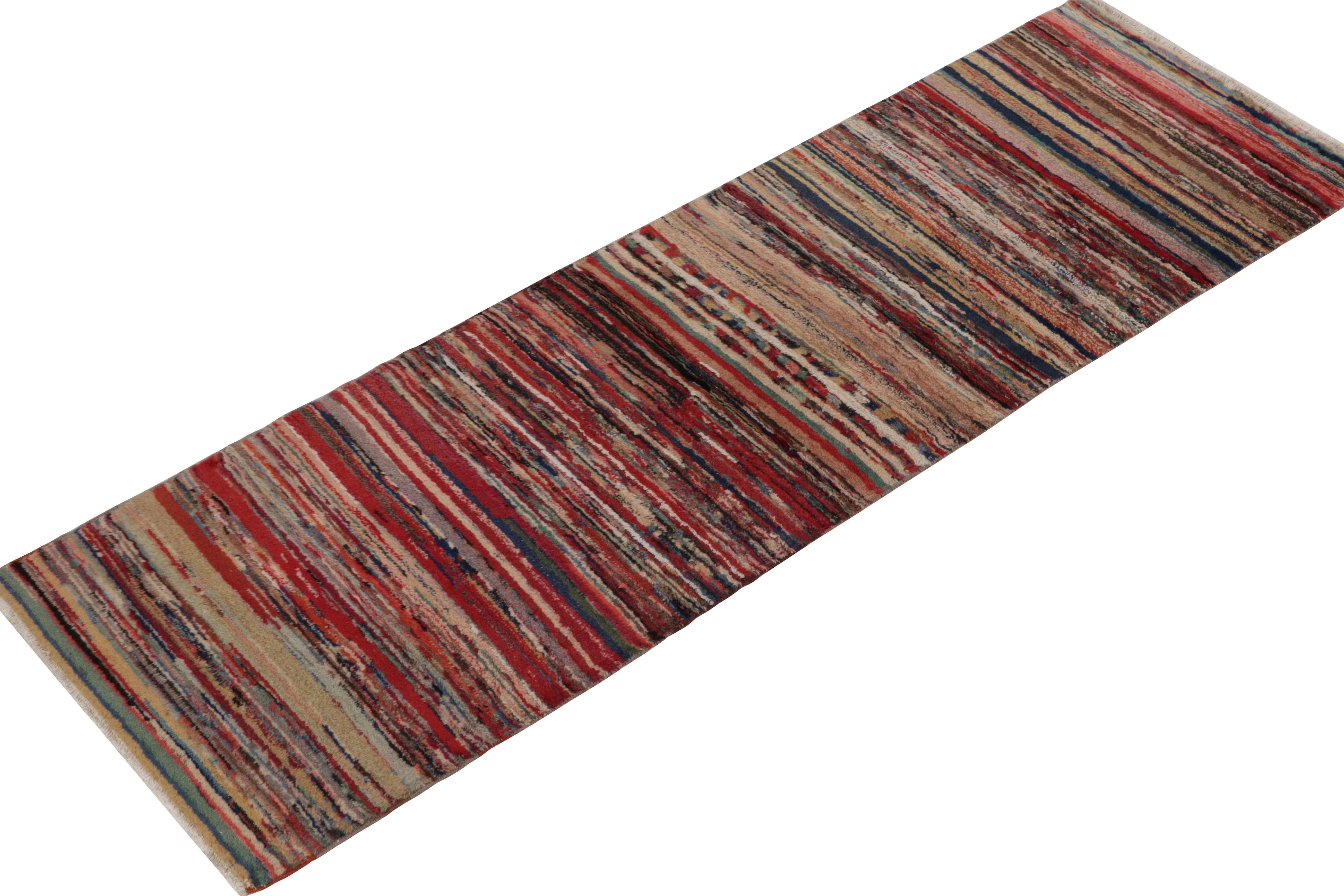 A vintage 3x8 mid-century runner from the Mid-Century Pasha Collection by Rug & Kilim — celebrating the rare works believed to hail from multi-disciplinary Turkish icon, Zeki Müren. 

On the Design: Hand knotted in wool, the striped pattern sits